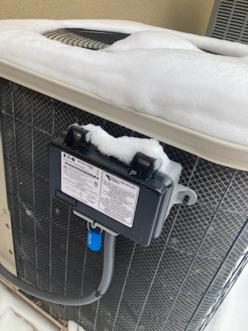 Image depicting a residential HVAC system, possibly with a furnace being installed or inspected, representing furnace replacement costs and services.