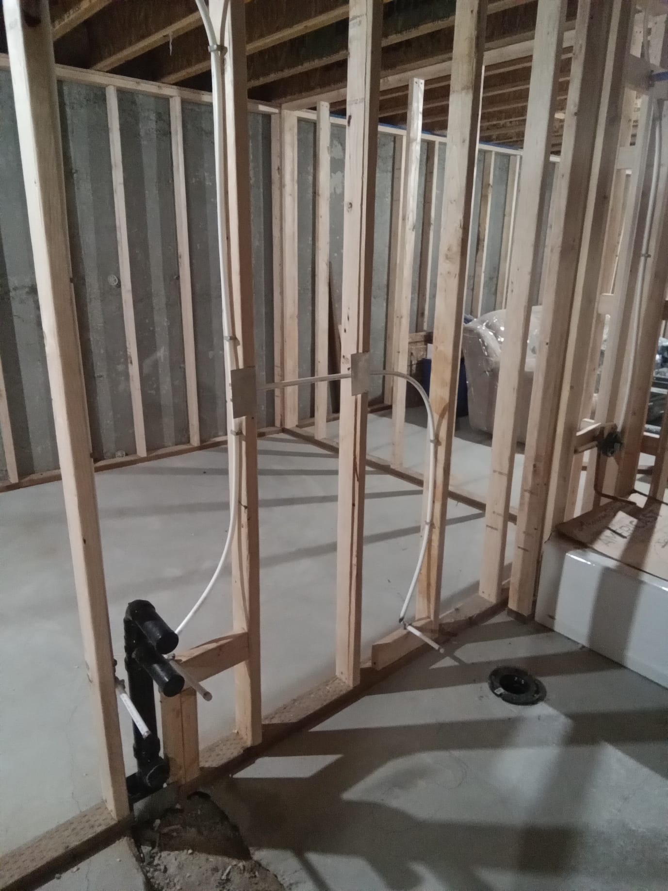 After a storm, a clean, bright bathroom with a gleaming, unclogged tub symbolizes restored comfort and peace of mind, thanks to insured storm and disaster remediation services.