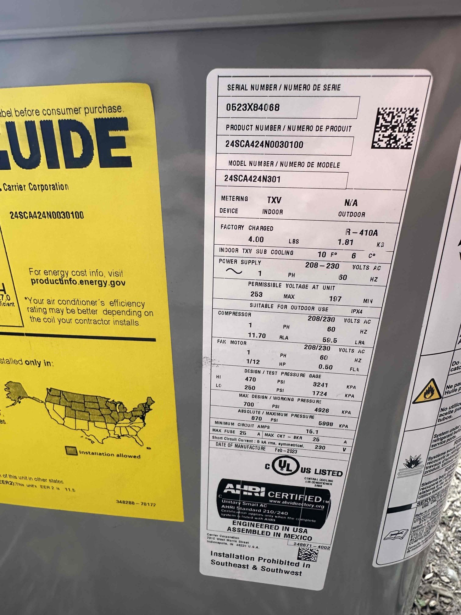 Close-up of a clean ventless air conditioning system highlighting its sleek design and energy efficiency. A room air purifier stands nearby, emphasizing improved indoor air quality and a healthy living environment. Light streams in, suggesting cost savings on HVAC inspections due to the system's ease of maintenance.