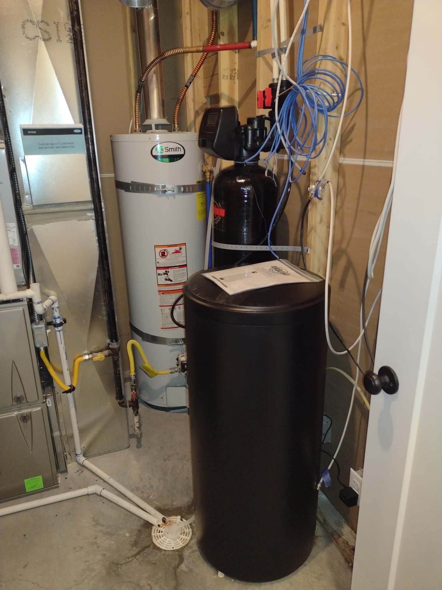 Image depicting water softener maintenance, conceptually linked to commercial grease trap cleaning and resin tank care. It symbolizes preventative measures for water systems, akin to maintaining grease traps to avoid plumbing issues. Proper water softener cleaning, including the resin tank, ensures optimal performance and longevity, preventing buildup and inefficiency.