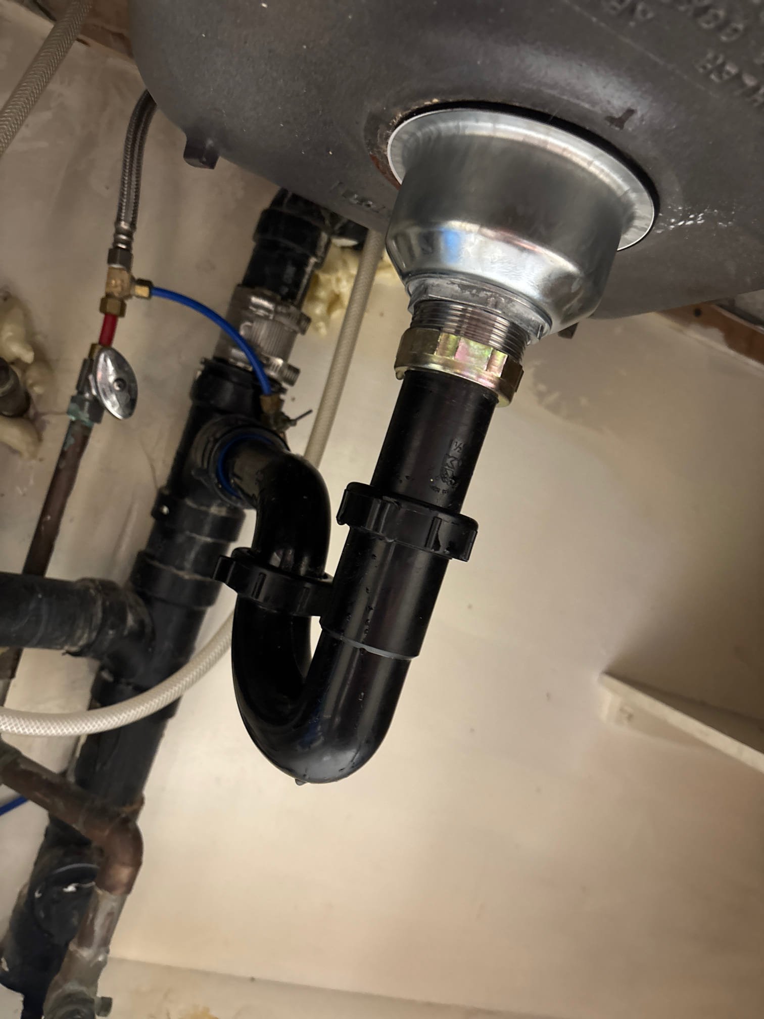 Mobile home water filter failure leading to water damage. Water leaking through the ceiling requires commercial ceiling water damage service.