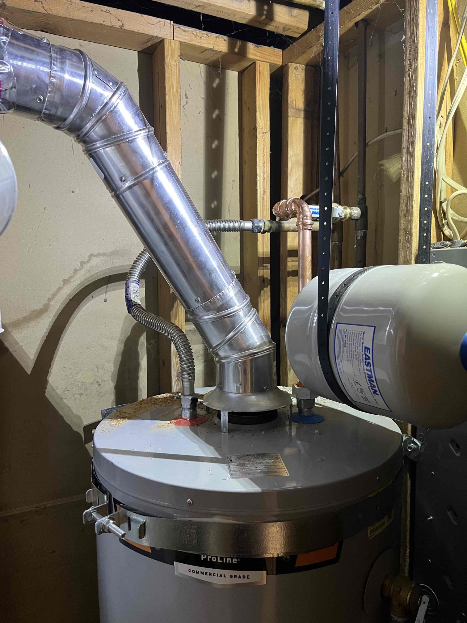 Commercial building interior showcasing clean, mold-free air ducts after professional restoration. Highlighted areas show the HVAC system's efficiency and leak-free components, promoting healthy air quality. Text overlay suggests 'Best A/C Company Near Me' for reliable mold remediation and HVAC services.