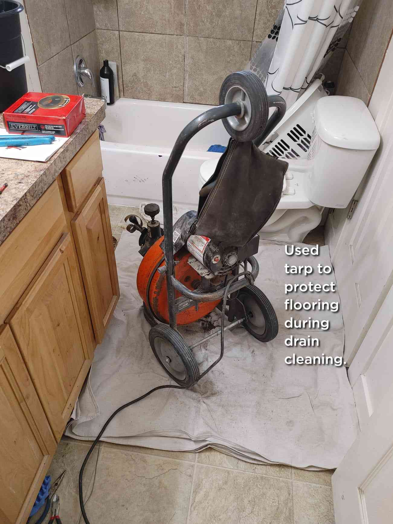 Technicians expertly repair a commercial water heater, showcasing their plumbing expertise that extends to lateral sewer lines, ensuring seamless operations and preventing costly disruptions for businesses.