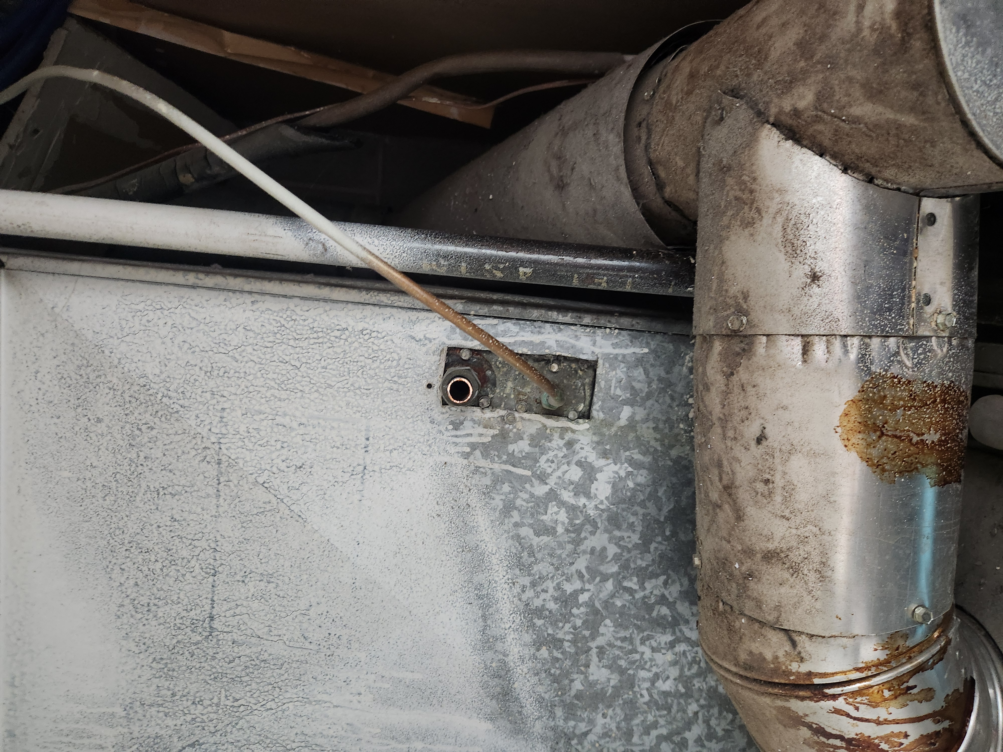 Image of a gleaming Lennox oil furnace, highlighting its robust construction and efficient design. Nearby text promotes local sales in Tomahawk, WI, and emphasizes commercial inspection services for reliable performance.