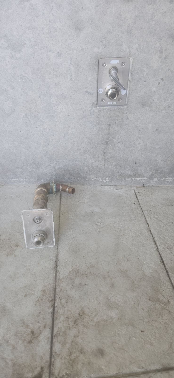 Amidst a commercial drywall water damage recovery scene, where workers mitigate noise, the image subtly hints at the benefits of a DIY soft water system preventing future damage, while highlighting the expertise of licensed professionals ensuring swift and effective restoration, showcasing pristine, repaired walls.