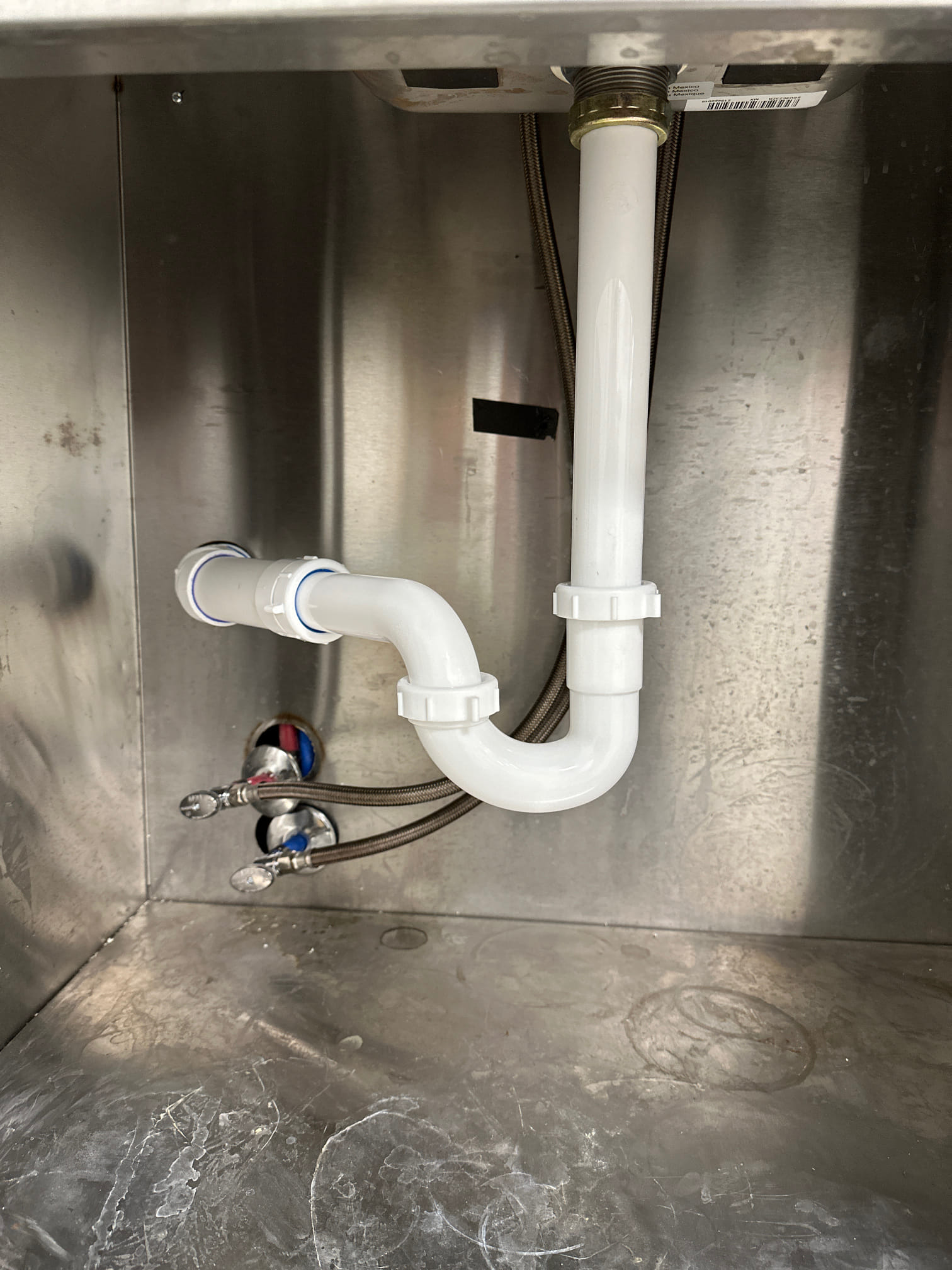 Image shows a pristine upholstered sofa after professional disaster cleanup. Before-and-after inset highlights stain removal, demonstrating the upholstery cleaning benefits of our comprehensive service.