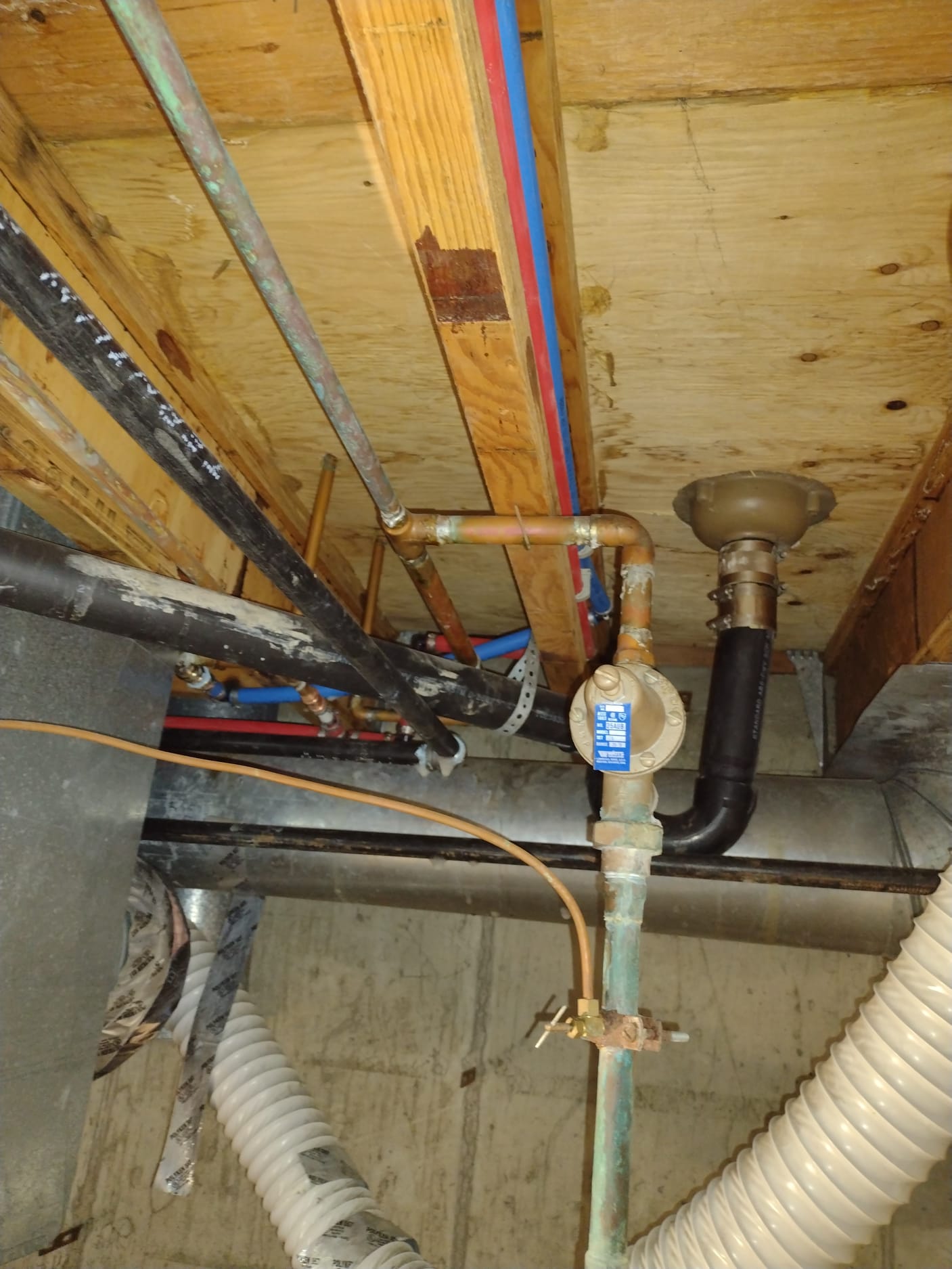 A dry, clean basement after water removal, illustrating the benefit of professional flood cleanup services. Prevents further damage and restores usable space.