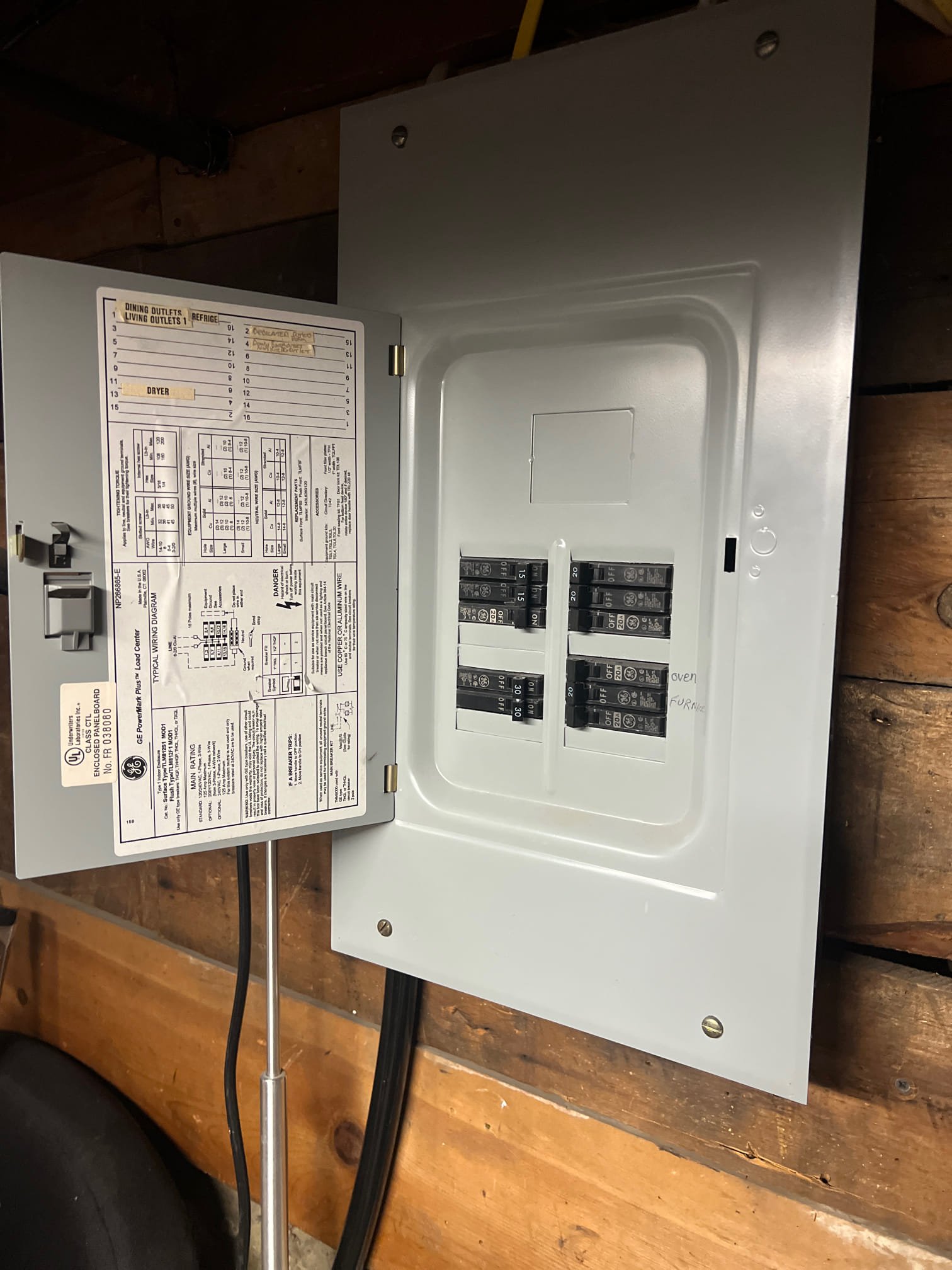 Close-up of a tablet displaying a clear, crisp video inspection of a swamp cooler's internal components. Sunlight streams through a window, highlighting the technician's focused expression as they provide a swamp cooler inspection estimate. Clean, well-maintained parts are visible on the screen, suggesting thoroughness and cost savings through early detection of issues.