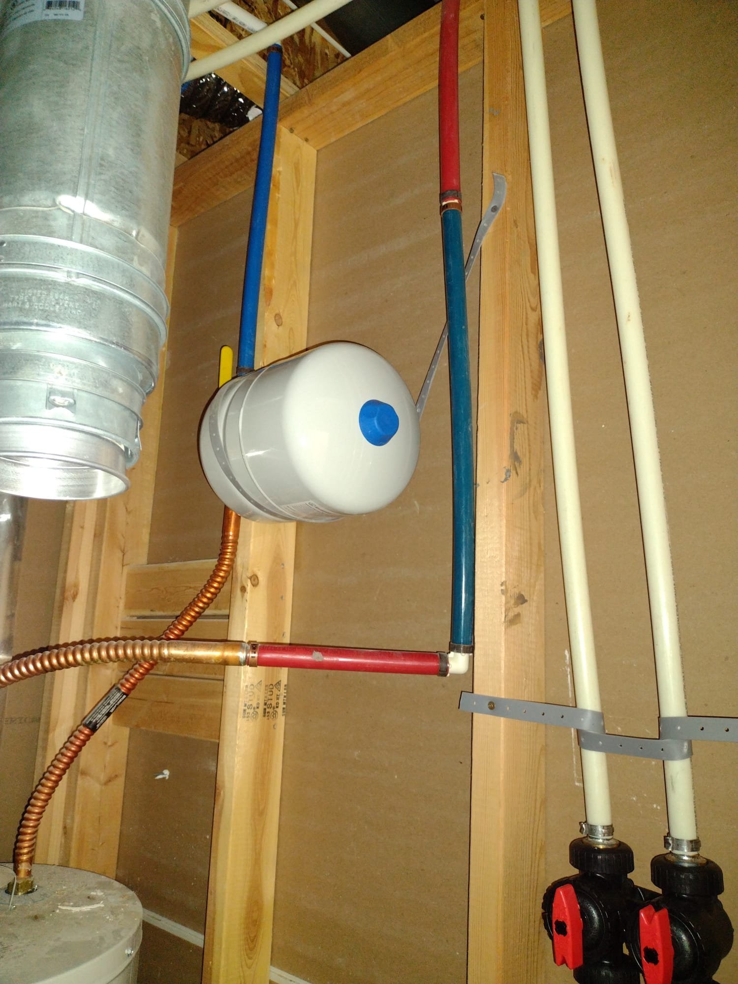 Image depicts a sparkling clean commercial kitchen grease trap, symbolizing the thoroughness of our cleaning services. In the background, subtle imagery alludes to restored drywall, representing our affordable water damage repair solutions. A visual promise of cleanliness and cost-effective restoration for your business.