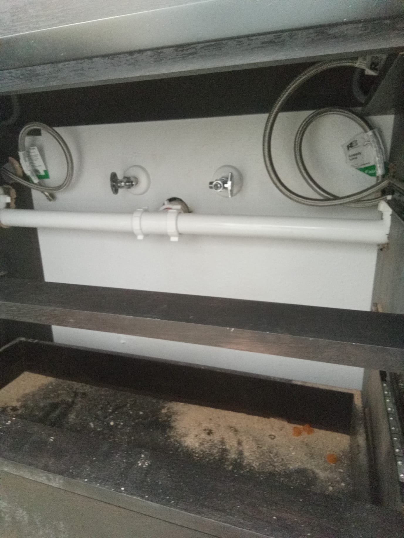 Clean, restored basement ceiling after water damage repair, showcasing the benefit of a water softener system for well water to prevent future issues. The image highlights the value of a professional basement ceiling water damage restoration estimate for a worry-free home.