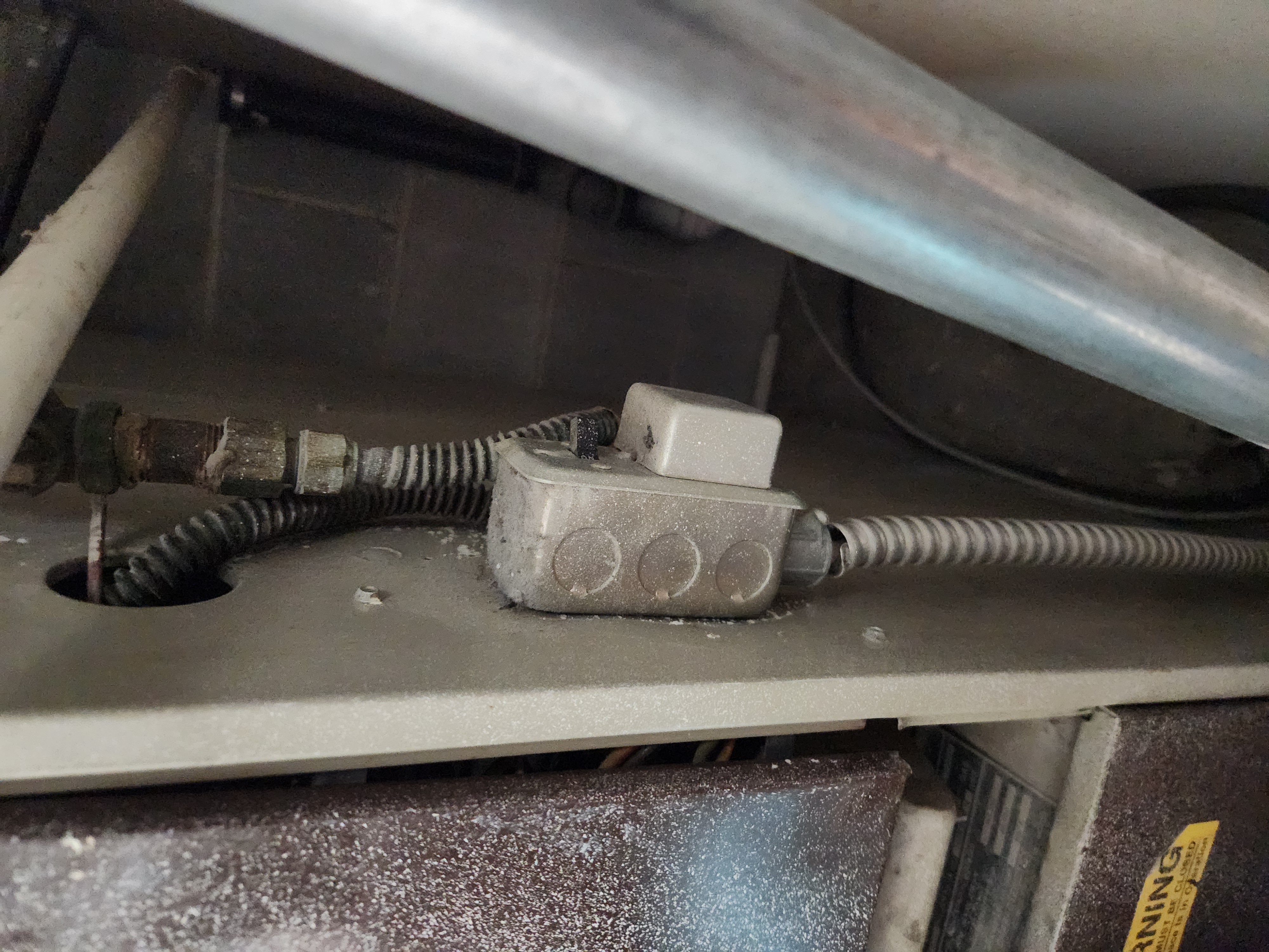 Image of a gleaming, new furnace inducer motor installed in a York furnace. Clean air filters are visible, suggesting improved efficiency and lower energy bills. A blurred background shows a home interior, implying comfortable temperatures and reduced need for a full furnace replacement, saving on potential furnace replacement estimate costs and avoiding York furnace blower motor replacement issues.