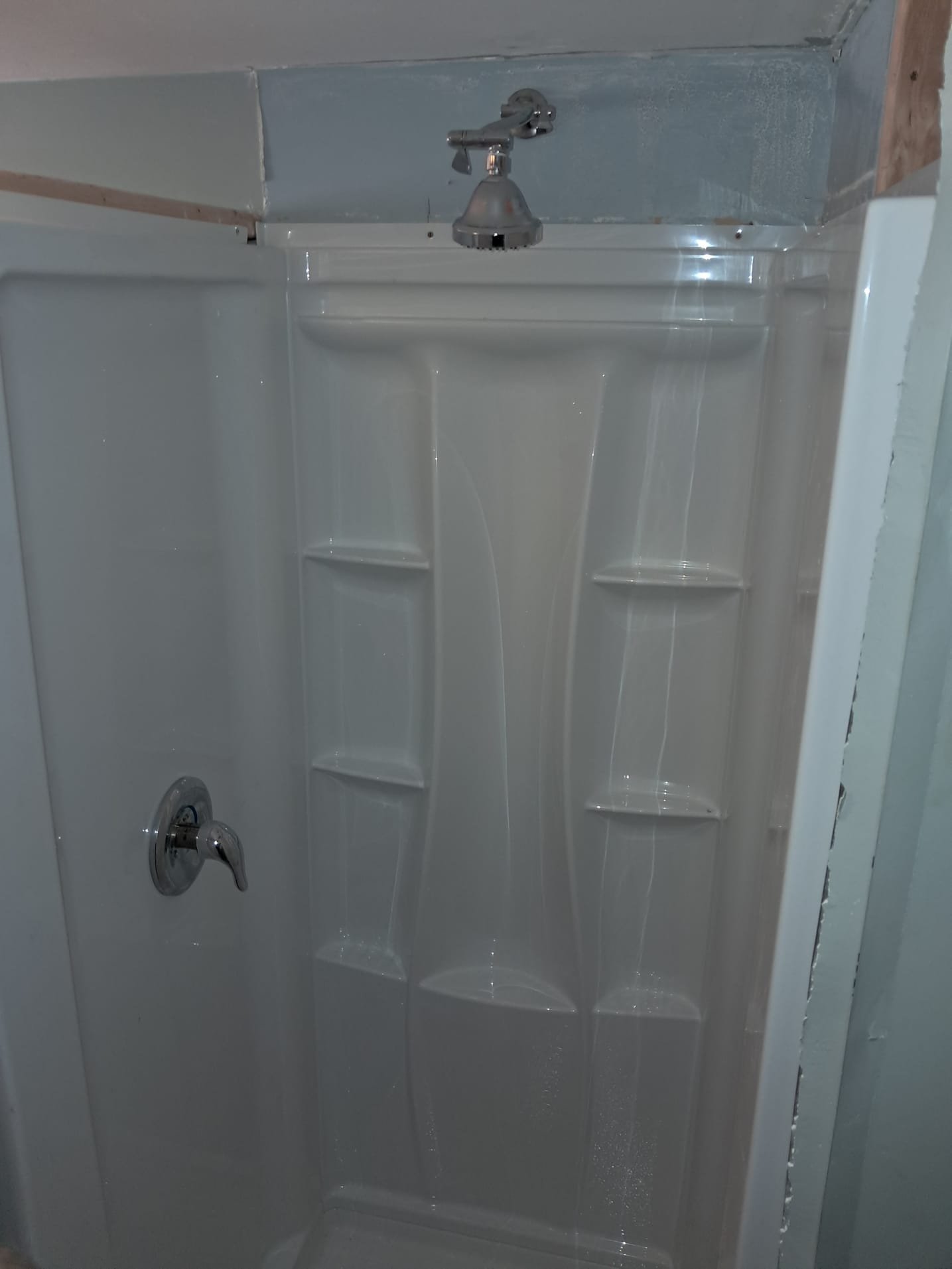 Close-up of a pristine floor drain with a new ball float, highlighting its clean and efficient design. The image subtly suggests the benefits of a replacement drain system, hinting at trenchless drain replacement through the neatness and lack of disruption around the drain.