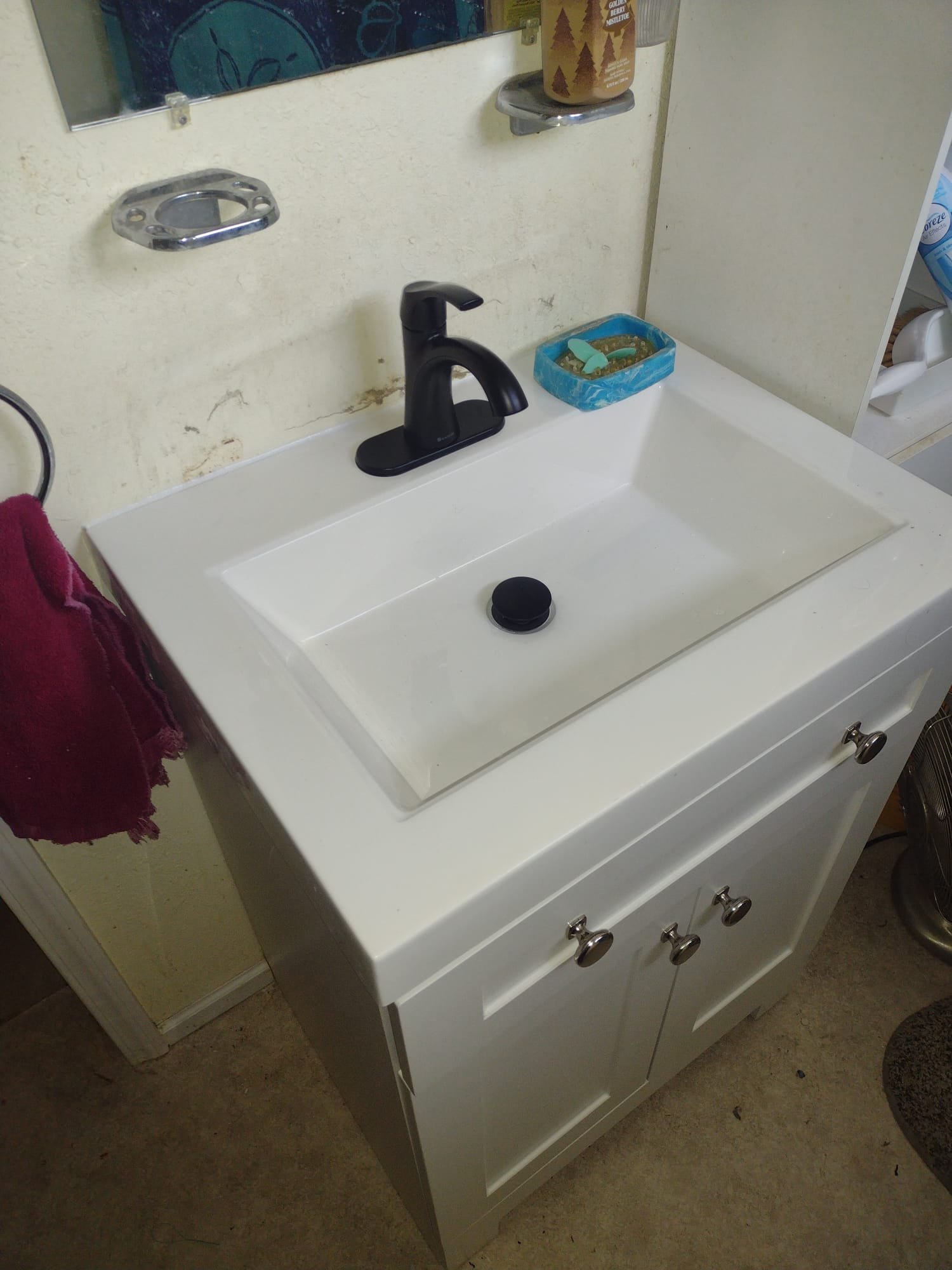 Cleaned basement drywall after water damage. Bright, restored space shows effective remediation, highlighting the benefits of prompt maintenance and 24-hour service.