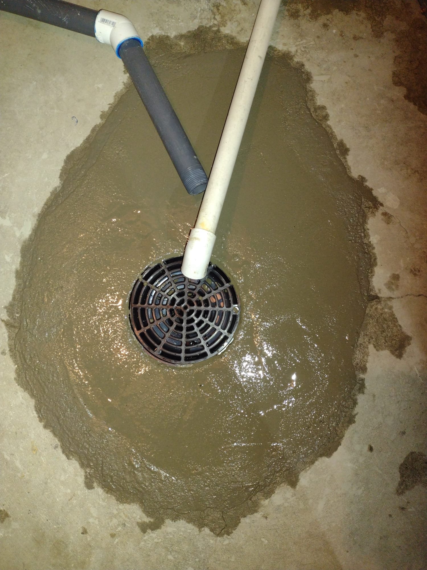 Image of a commercial building interior undergoing fire remediation. Workers in safety gear are repairing fire damage, highlighting the restoration process and minimizing business downtime, ultimately controlling remediation costs.