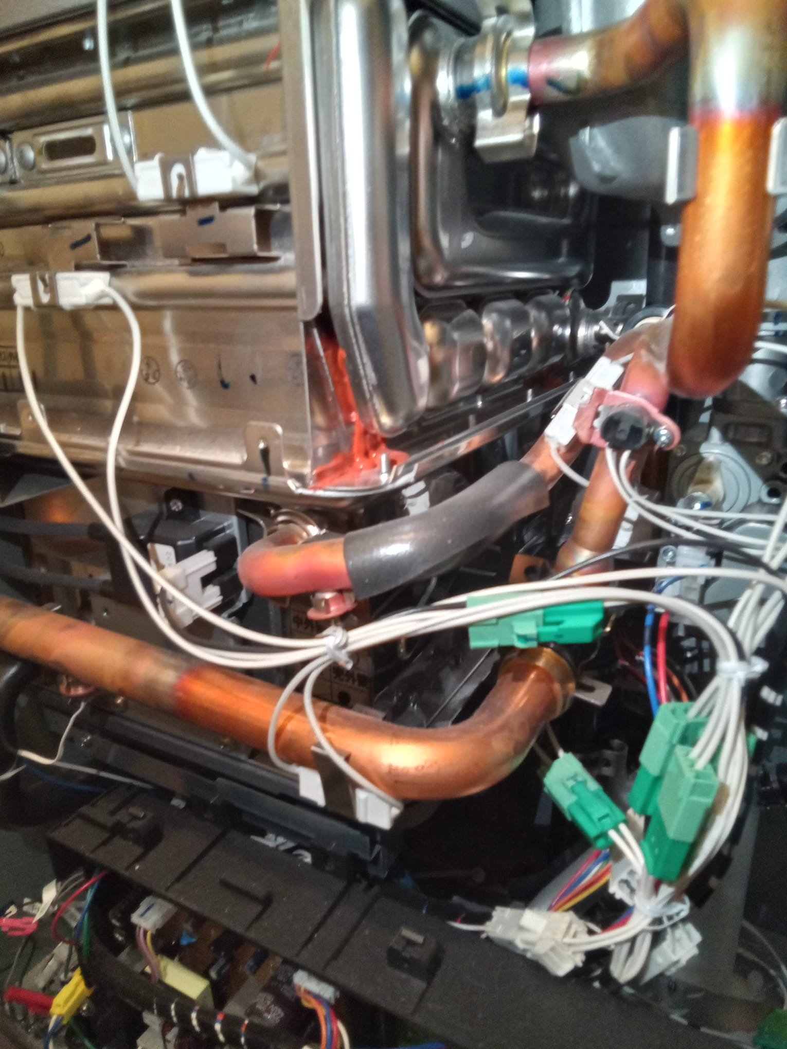 A well-organized set of plumbing tools, including a basin wrench, adjustable wrench, plumber's tape, and a bucket, are neatly arranged, implying ease and readiness for sink or bathtub faucet replacement. The clean, uncluttered background suggests a straightforward, successful DIY project.