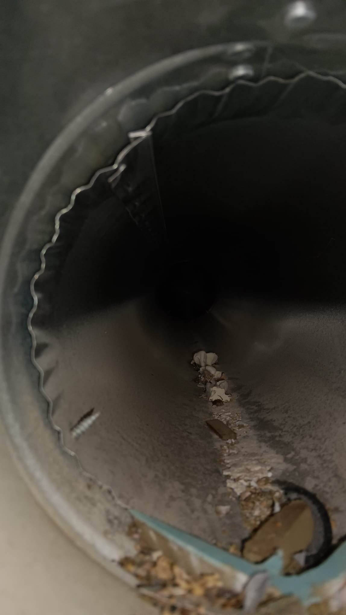 Clean restaurant kitchen interior showcasing a newly installed air cleaner above the cooking area. The air is visibly clear, suggesting effective grease and smoke removal, implying benefits of professional grease trap cleaning and after-hours smoke cleanup services.