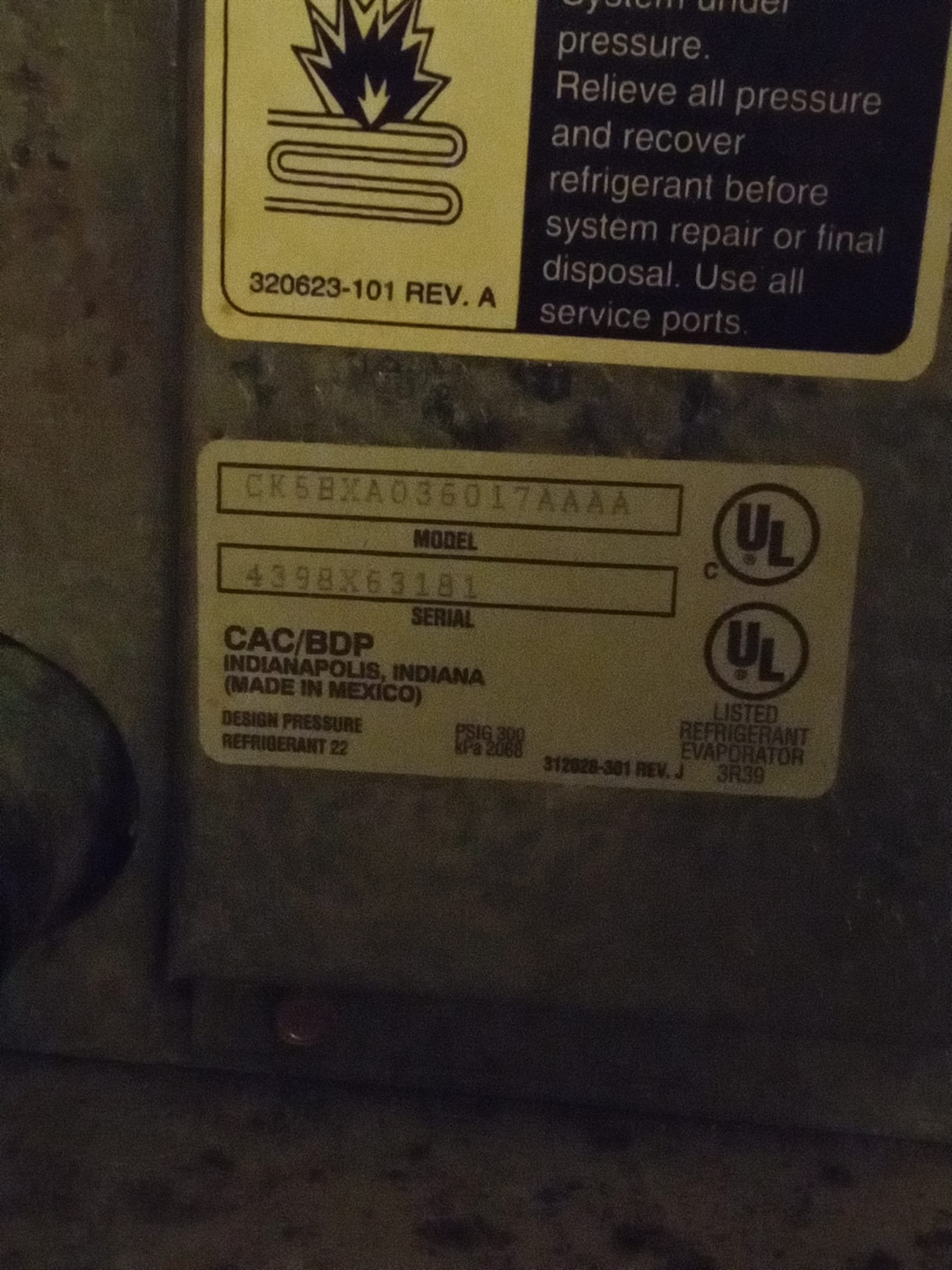 After-hours air conditioning repair: A technician works diligently in a dimly lit office, highlighted by the glow of his flashlight and the cool air visibly swirling from the repaired vent, promising relief and restored comfort. Air Repair Air Conditioning - your MD solution.