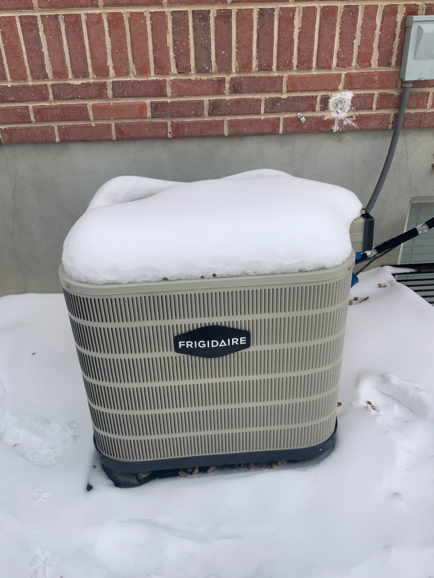 A clean, bright living room after smoke damage restoration. An air purifier is subtly visible in the corner, symbolizing odor removal. The image conveys a fresh, restored home environment, showcasing the benefits of professional smoke remediation and air purification.