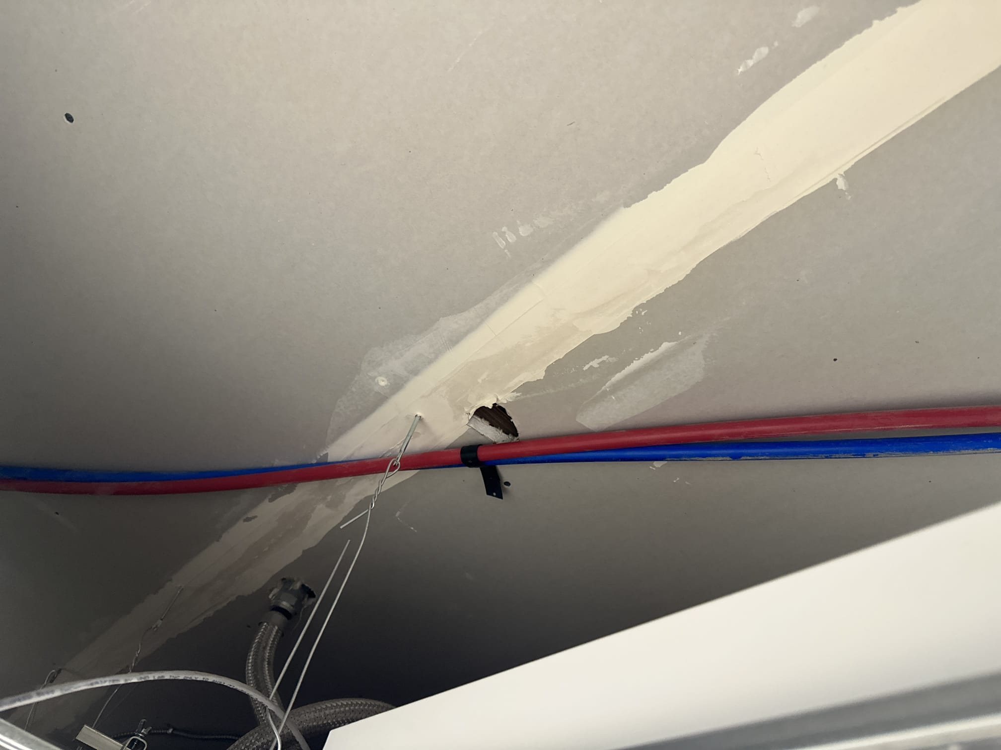 Upholstery being professionally cleaned after a disaster. Notice the clear difference between the stained and cleaned sections, demonstrating effective emergency disaster cleanup and restoration.