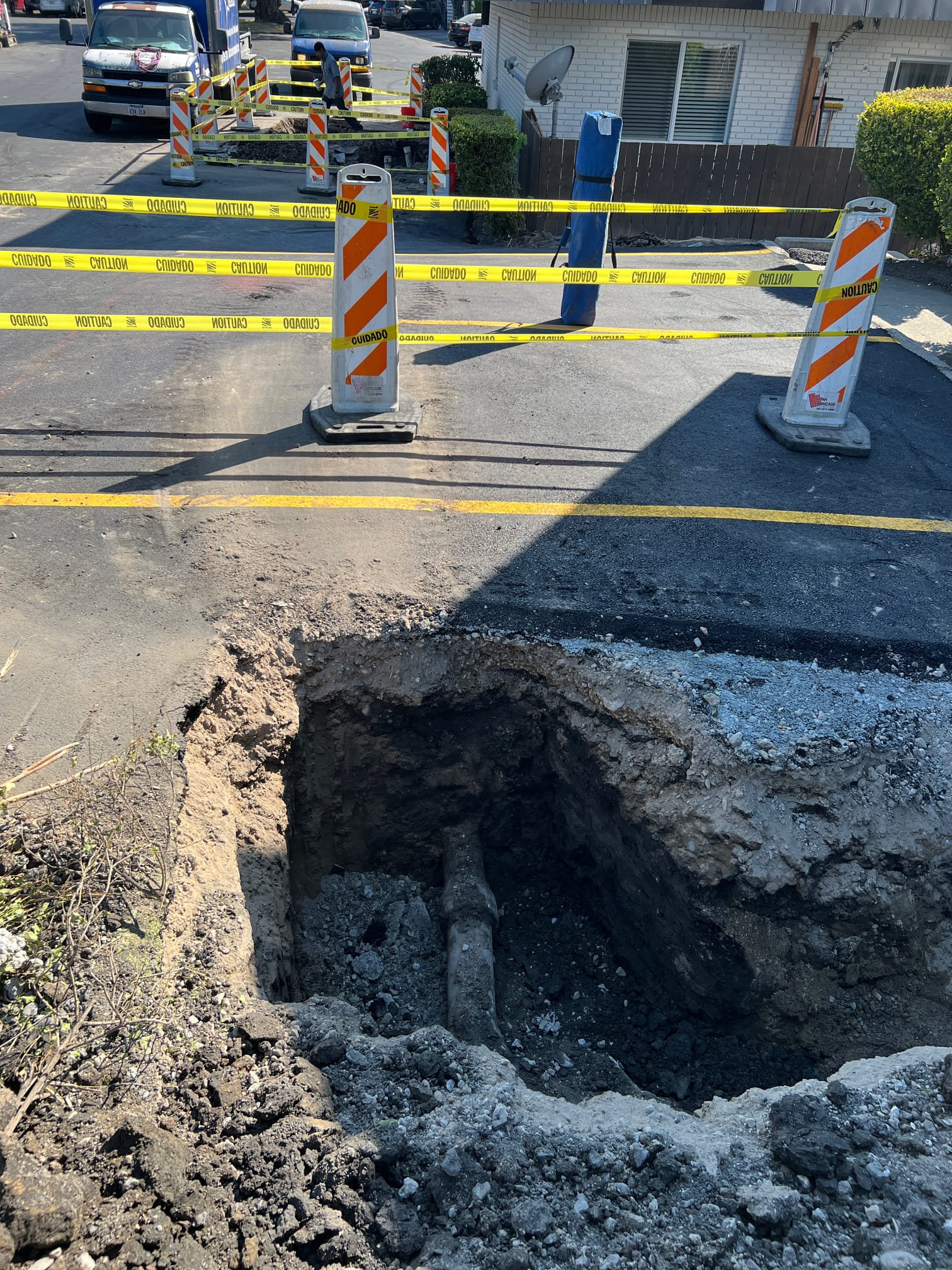 After-hours basement water damage recovery. The image shows a clean, dry basement after emergency restoration. Newly installed energy-efficient appliances and a dehumidifier highlight potential rebates for home improvements. Bright lighting and organized storage emphasize the benefits of a restored and upgraded space after water damage.