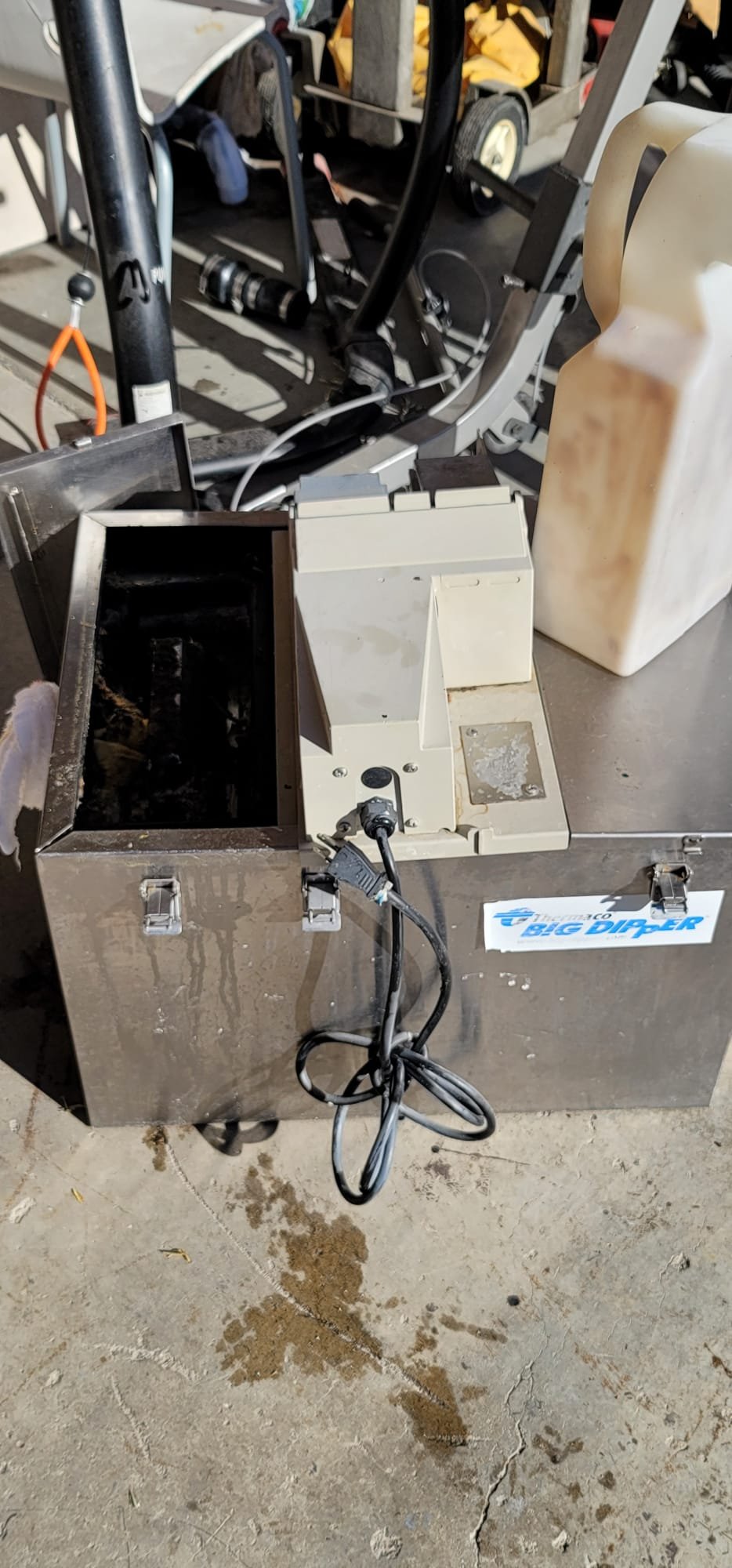 After-hours commercial flood damage restoration. The image highlights a clean, dry commercial space post-flood, with visible, new flush valve components gleaming, symbolizing the thoroughness of the emergency odor and water removal process. The scene implies a return to normal business operations, free from flood damage and lingering odors.