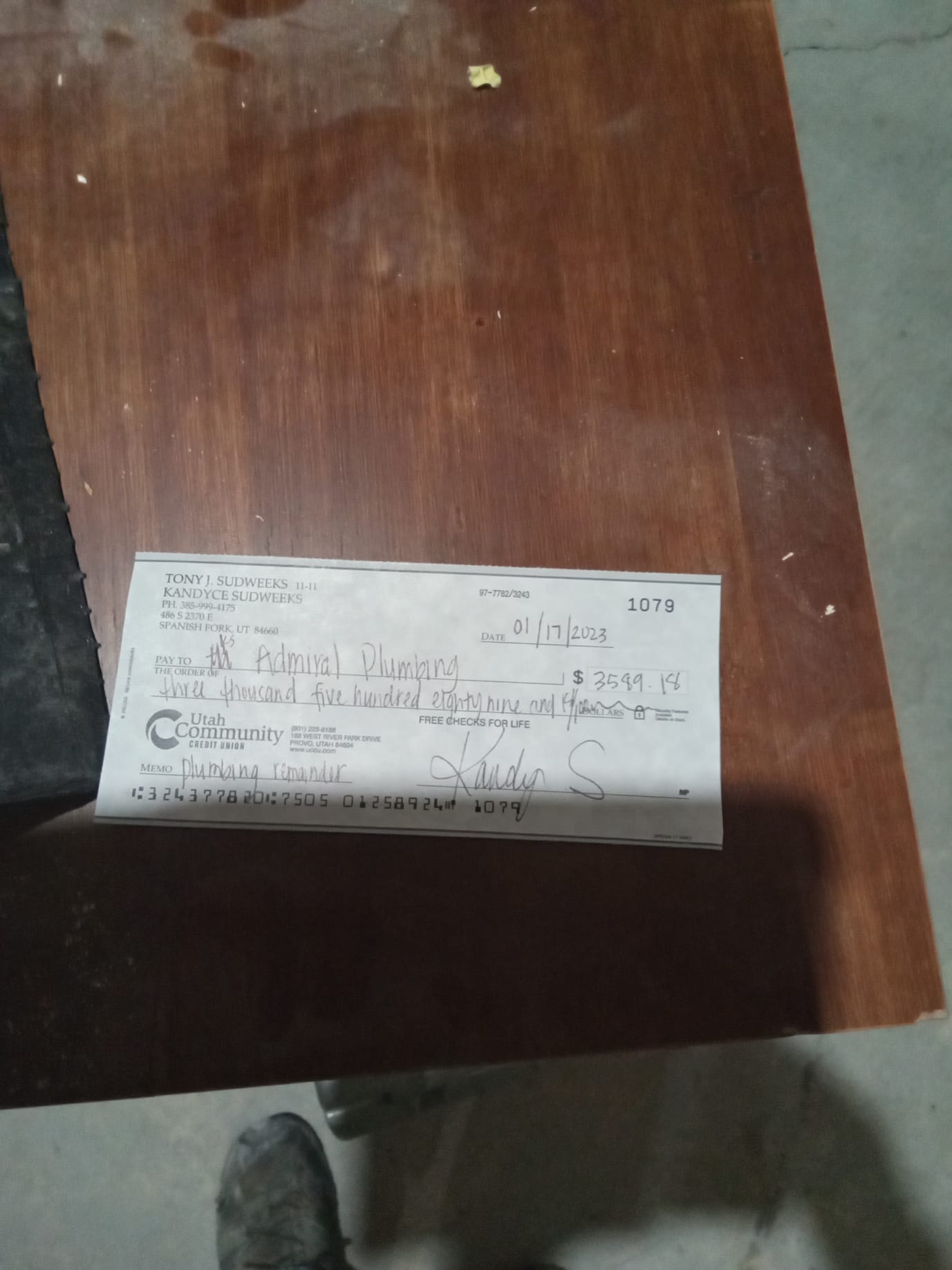 Image depicting a clean, uncluttered bathroom with a sparkling tub, juxtaposed with a split-screen showing a storm-damaged home being professionally inspected. The clean bathroom symbolizes the peace of mind gained from preventative measures (like knowing a simple tub clog remedy) and the inspected home represents the thoroughness of disaster remediation, implying value and comprehensive pricing.