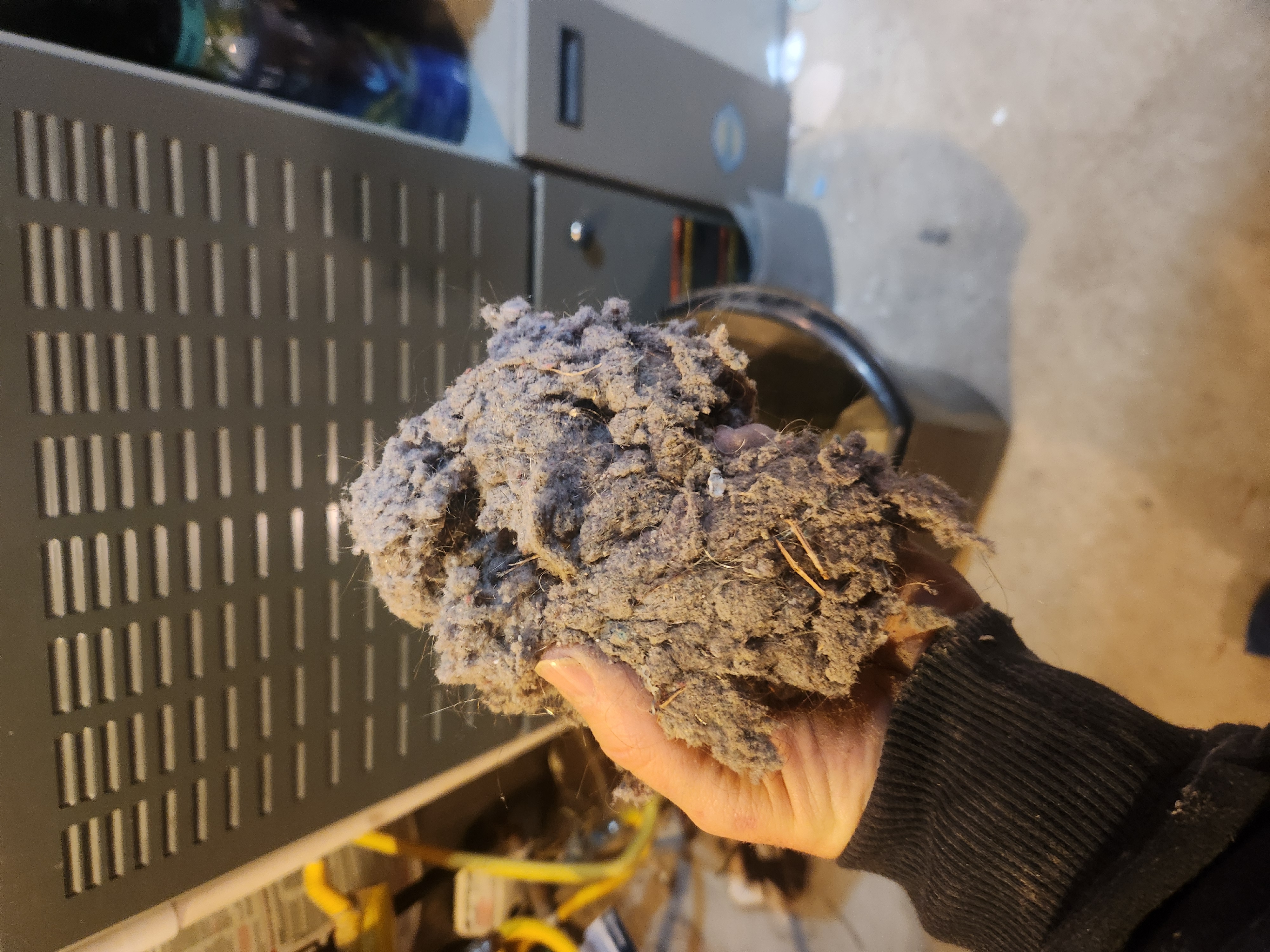 Close-up of a sparkling clean commercial bathroom sink, reflecting bright light, achieved through same-day mold cleaning. Baking soda and vinegar bubbles highlight the effectiveness of the cleaning process, showcasing a pristine, mold-free environment.