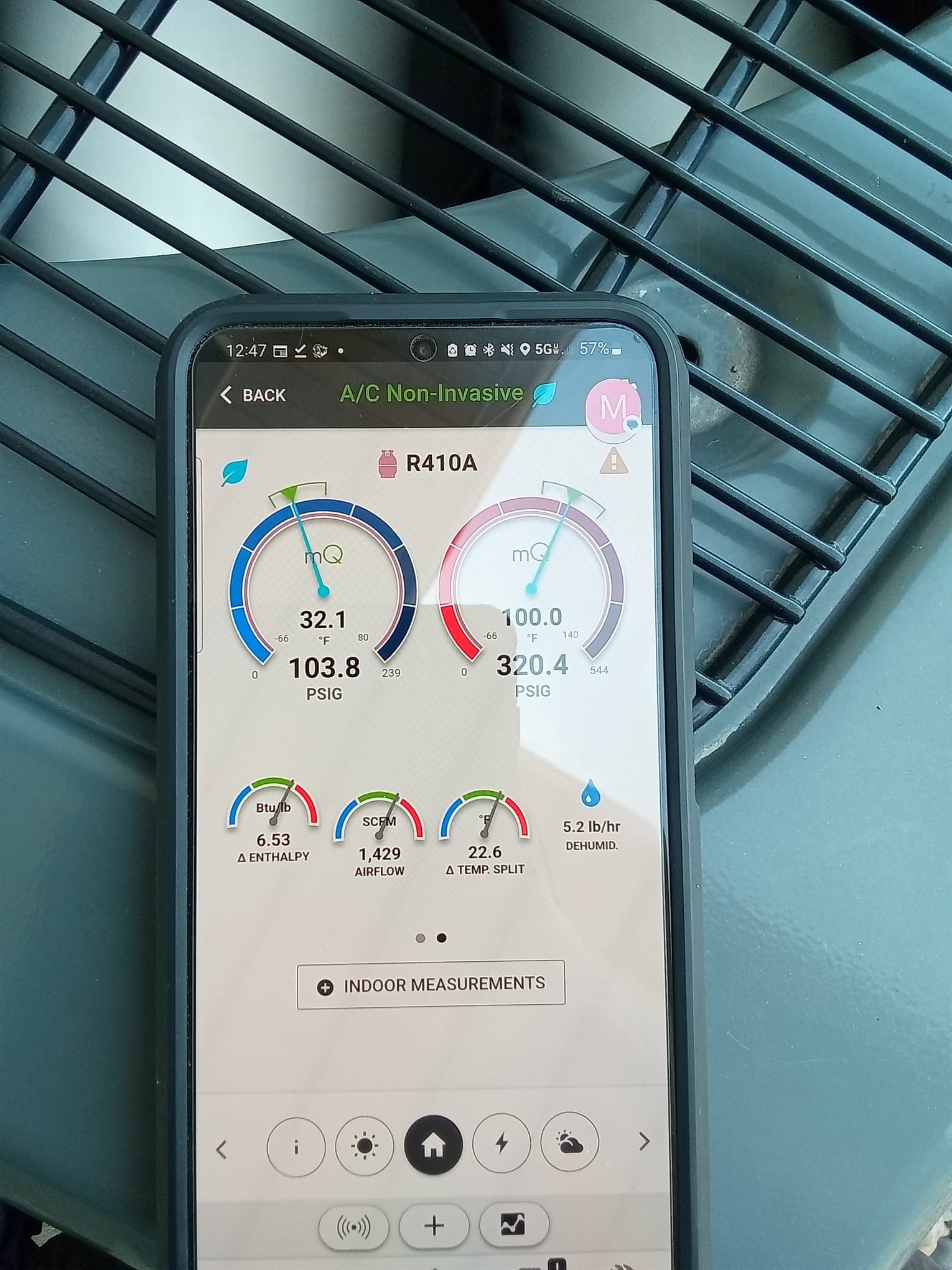 Leaky faucet with water droplets, symbolizing wasted money. In the background, a home interior with comfortable temperature, indicating the benefits of professional cooling & heating services for efficient plumbing and preventing costly repairs like faucet drips and leaks.