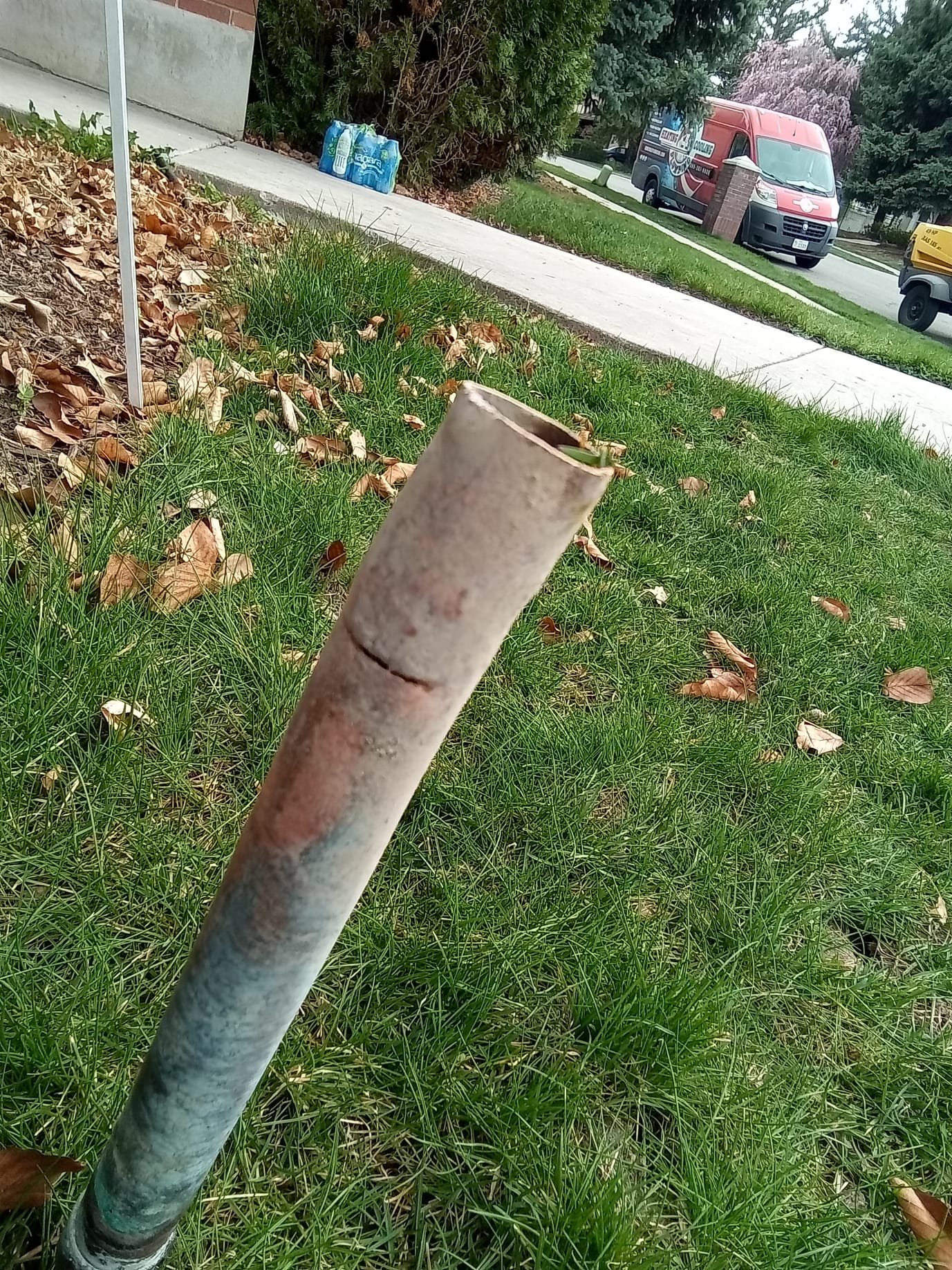 Image of a friendly plumber fixing a pipe with a satisfied customer in the background. A '5-star reviews' badge is prominently displayed, and a '24/7 emergency service' van is parked outside, suggesting reliability and immediate availability.