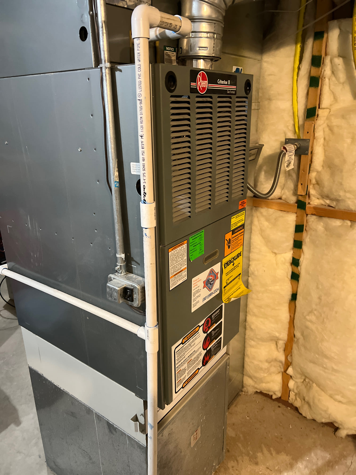 Close-up of a clean, pleated furnace filter, recommended for NPF Hydro furnaces, with bright, even lighting suggesting optimal airflow and system efficiency. A blurred background hints at a commercial setting, implying suitability for professional furnace maintenance and repair.