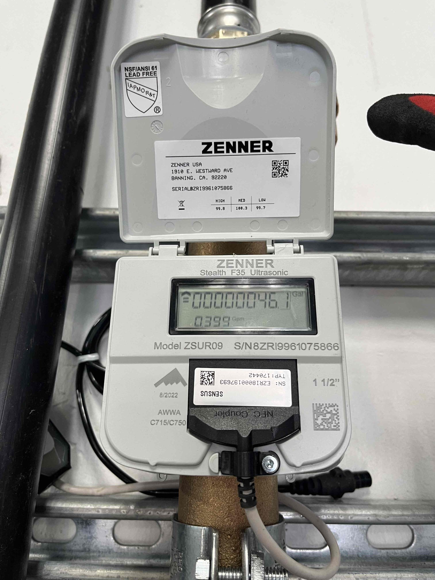 Close-up of a plumber expertly repairing a pipe, showcasing their hands skillfully sealing a leak. Bright, clean water flowing smoothly afterwards symbolizes successful plumbing leak repair and reliable water leak repair maintenance.