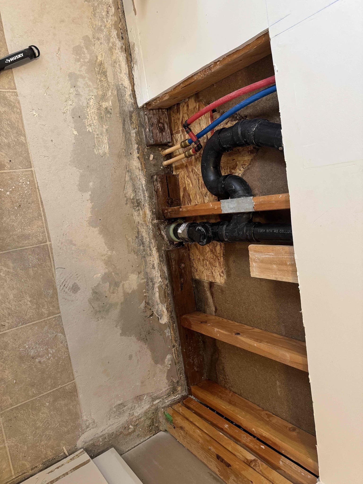 After-hours emergency fire restoration scene, potentially involving smart home systems. The aftermath suggests urgent intervention, possibly requiring understanding of wiring diagrams like a 'Nest 4 wire diagram' for system recovery and safety during the fire damage repair process.