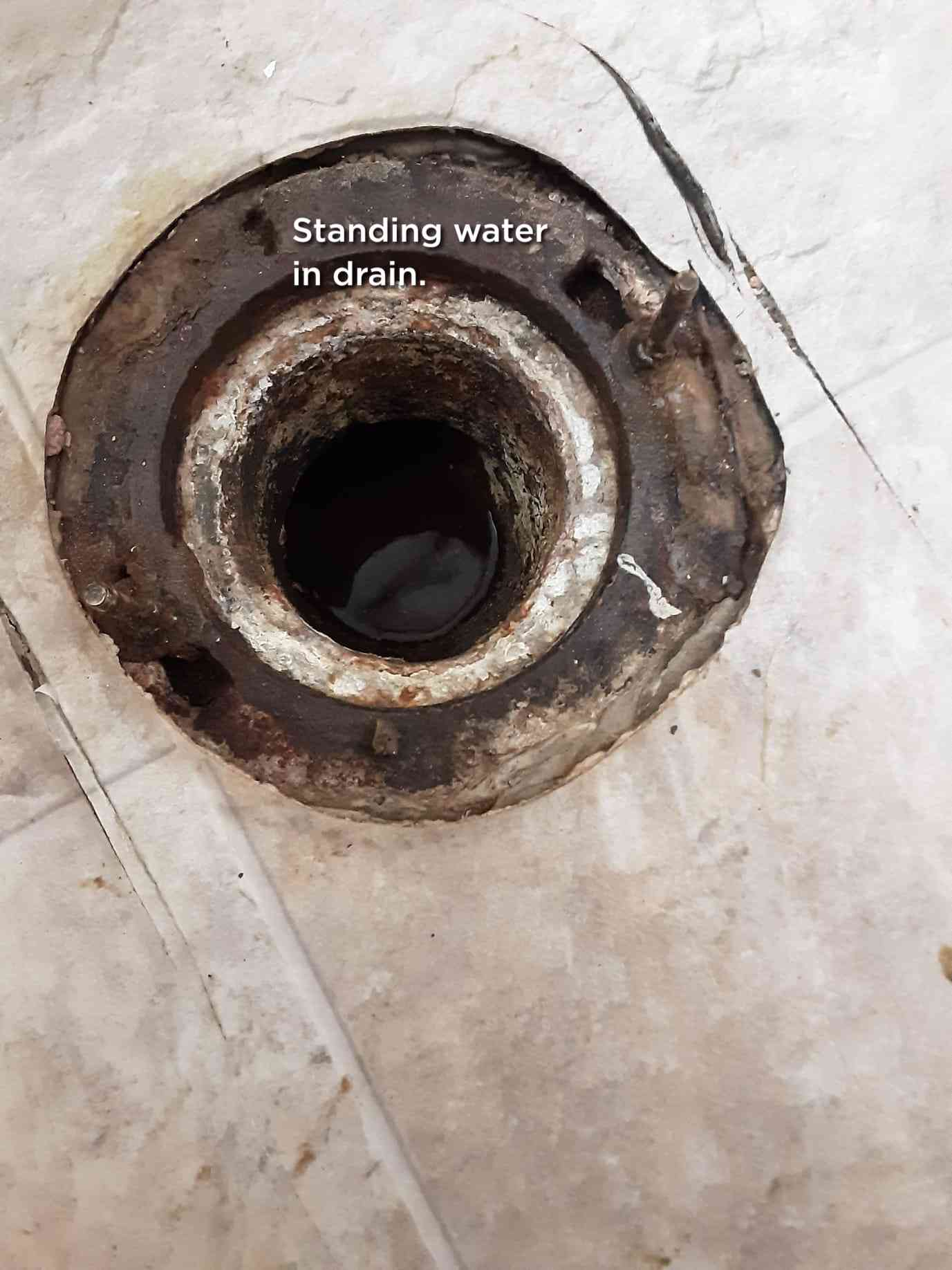 Image showcasing no-dig sewer repair benefits for lateral and commercial lines. Notice the minimal disruption to the landscape and building, highlighting a clean, efficient, and cost-effective solution compared to traditional methods.