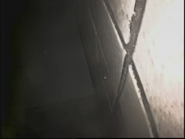 Image showcasing a powerful hydro jet cleaning a sewer line. High-pressure water stream blasts away years of buildup, visually demonstrating the effectiveness of hydro jetting for a clean and free-flowing sewer line. Illustrates the value of hydro jet drain cleaning and sewer jetting services.