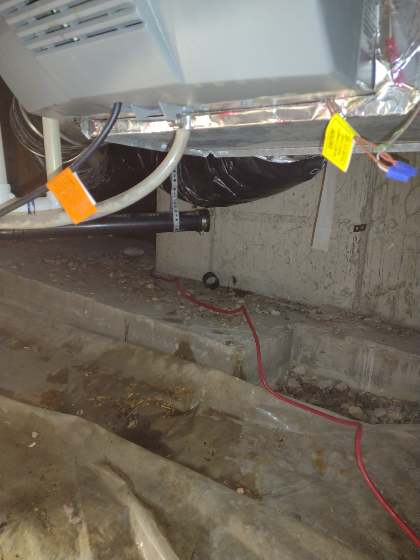 A brightly lit, clean basement restored after a storm, showcasing the benefits of same-day disaster repair. Modern AC unit visible, symbolizing efficient climate control and hinting at affordable repair payment plans for a comfortable, worry-free home.