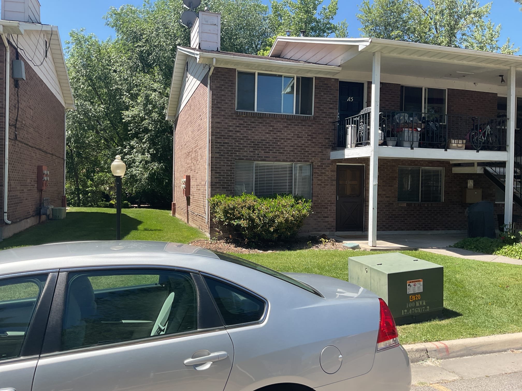 A yard with effective drain pipes preventing water buildup, highlighting the benefit of avoiding collapsed drains. A 1/2" drain snake is nearby, suggesting easy maintenance and preventative care to keep the system flowing smoothly.