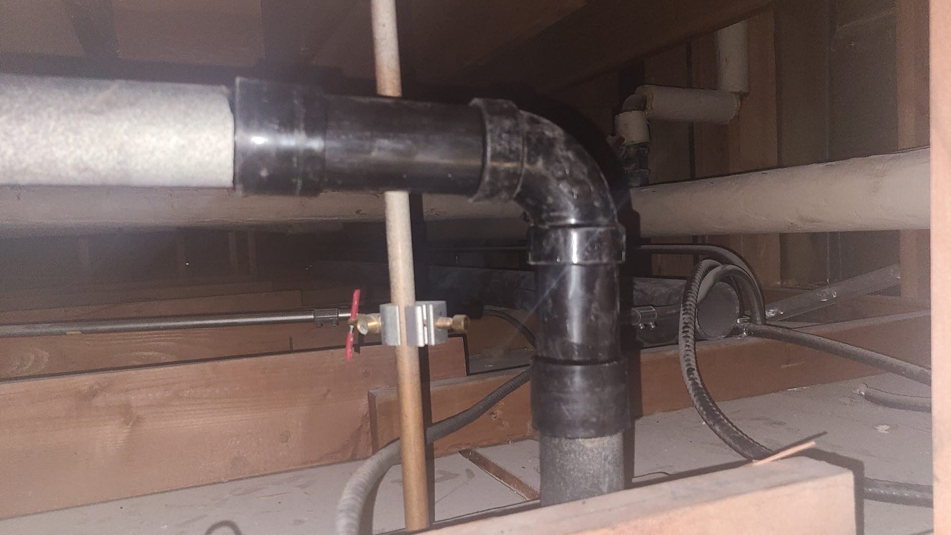 Diagram illustrating French drain dimensions alongside patio drainage solutions and a kitchen sink disposal drain setup. Visual emphasis on effective water management and preventing water damage.