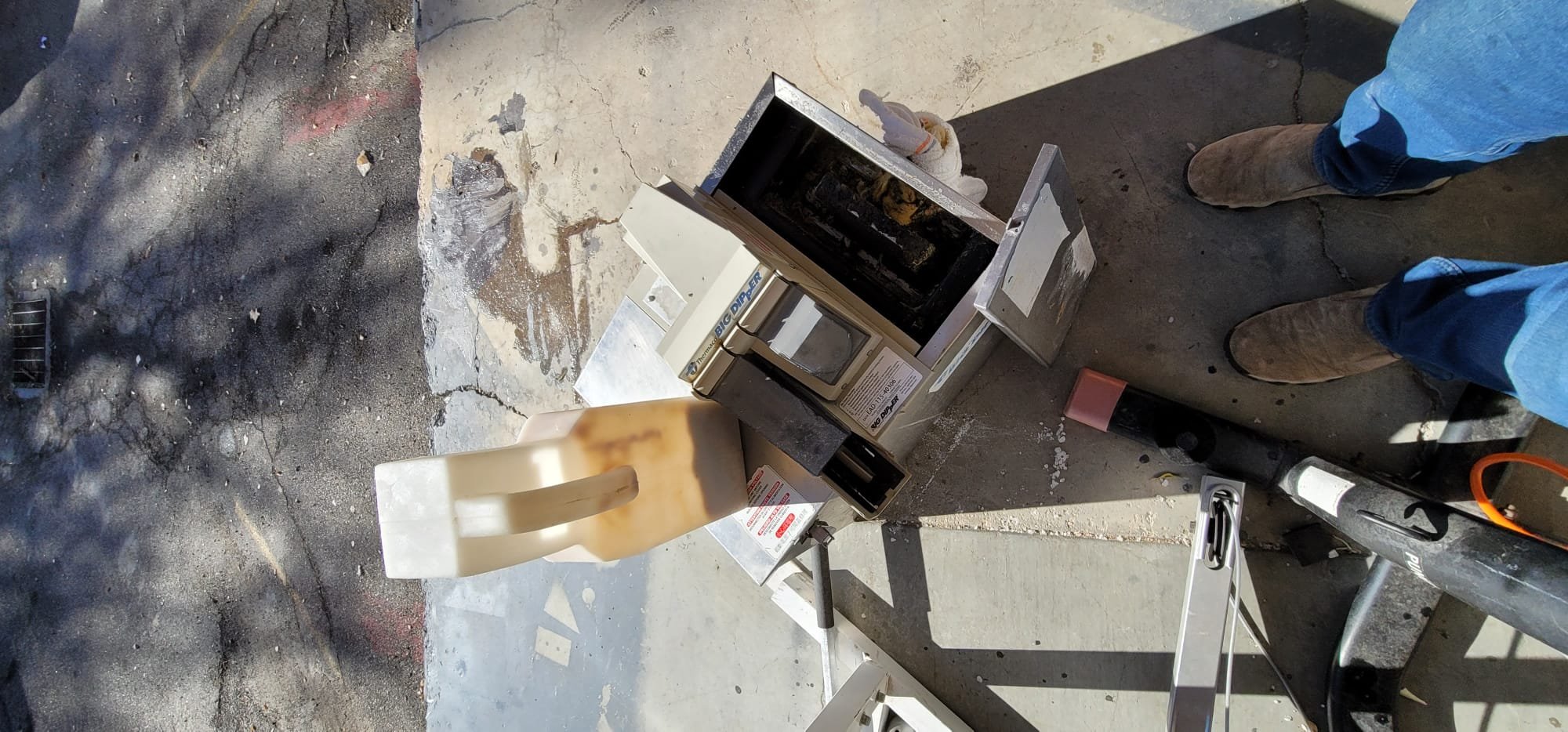 Commercial flood odor removal service image. Focus on flush valve components potentially affected by flood damage, highlighting professional odor removal to restore a commercial property. Related to commercial flood odor removal service.