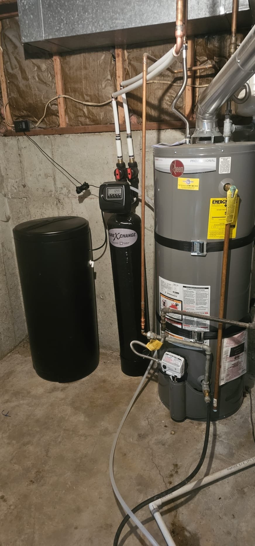 Clean, bright residential interior showcasing newly installed drywall after water damage remediation. Focus on the smooth, pristine surface and the fresh, airy feel of the room, hinting at improved air quality from thorough dryer vent cleaning and preventative water damage maintenance.