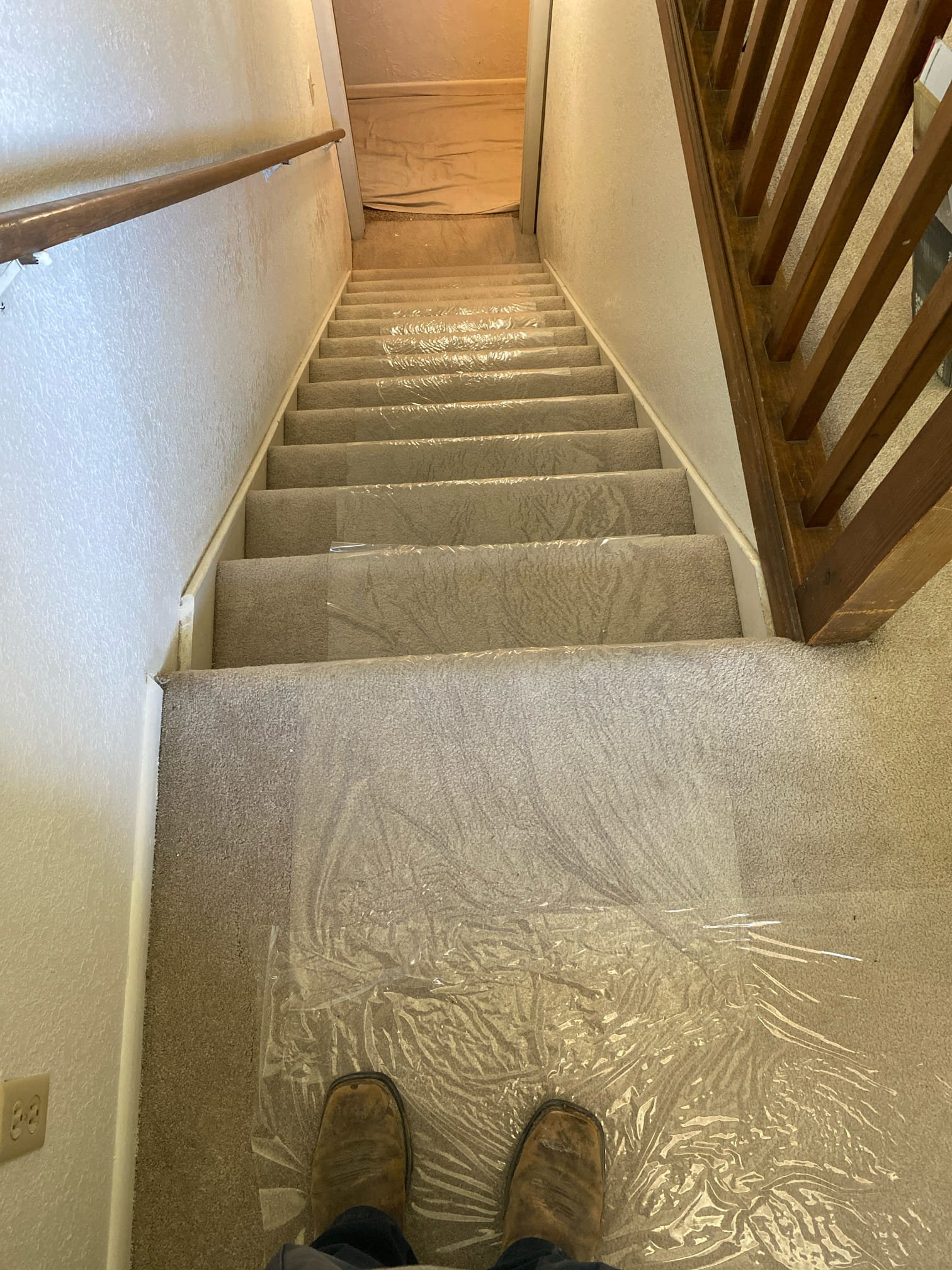 Image of a restored living room after a fire; warm lighting highlights the clean, comfortable space, subtly showcasing the benefits of affordable and 24-hour residential fire restoration services.