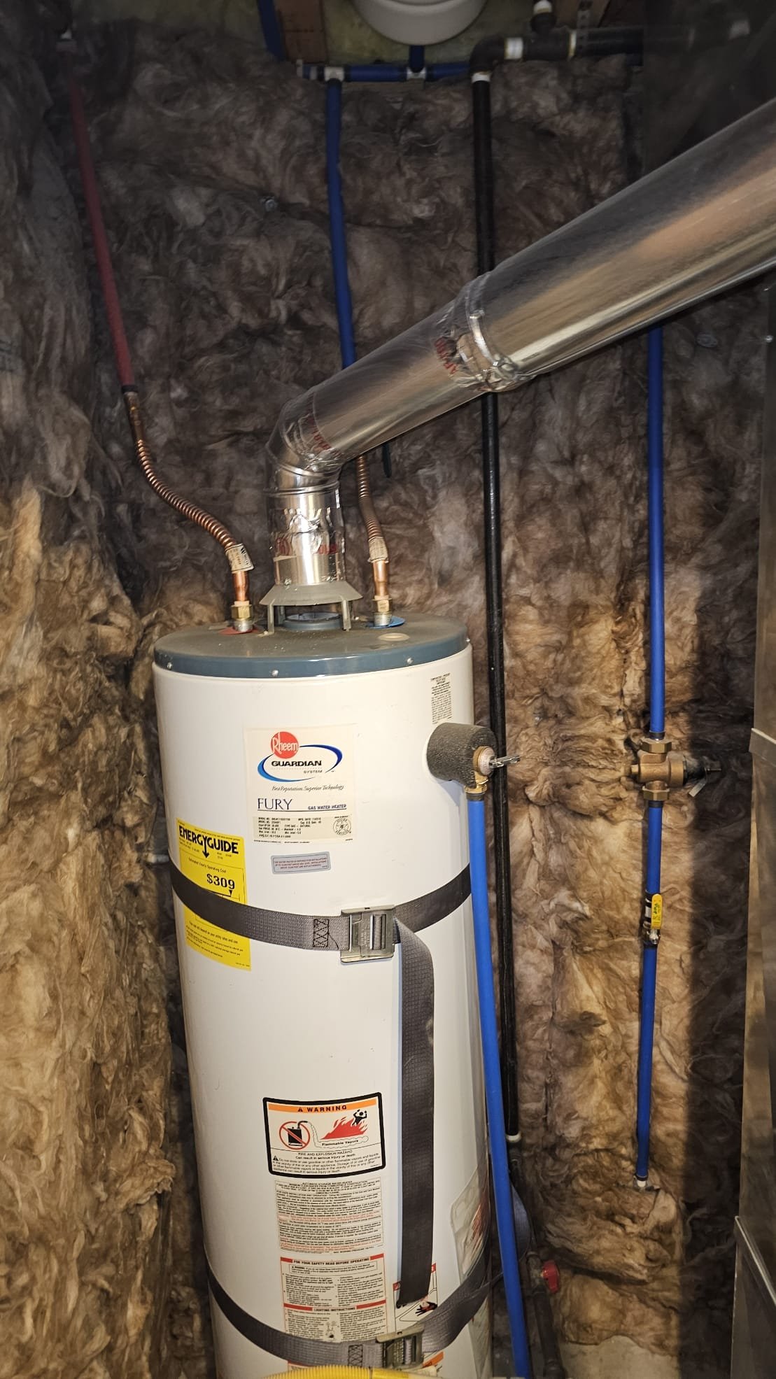 After-hours drywall damage from a water softener leak, now restored. Smooth, repaired walls showcase the benefit of emergency recovery, preventing further home damage and highlighting the potential cost savings compared to extensive repairs from delayed action.