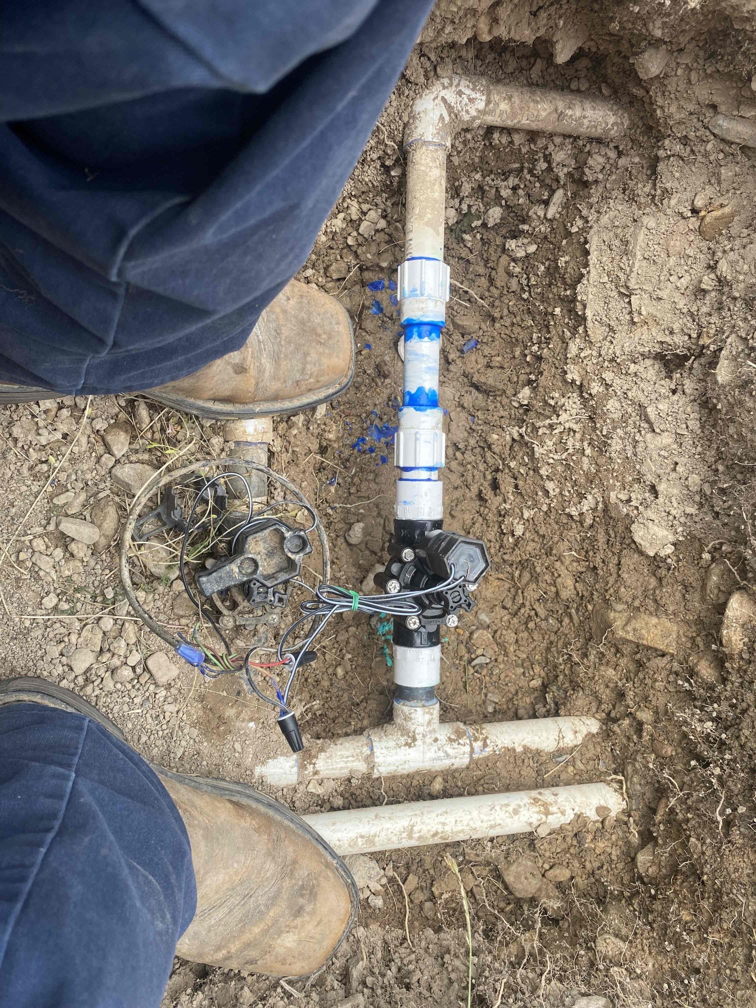 Ceiling with repaired water damage, showcasing a smooth, newly painted surface. Undamaged area highlights the restoration's seamless blending, suggesting quality repair and restored property value. The pristine condition implies successful insurance claim resolution.