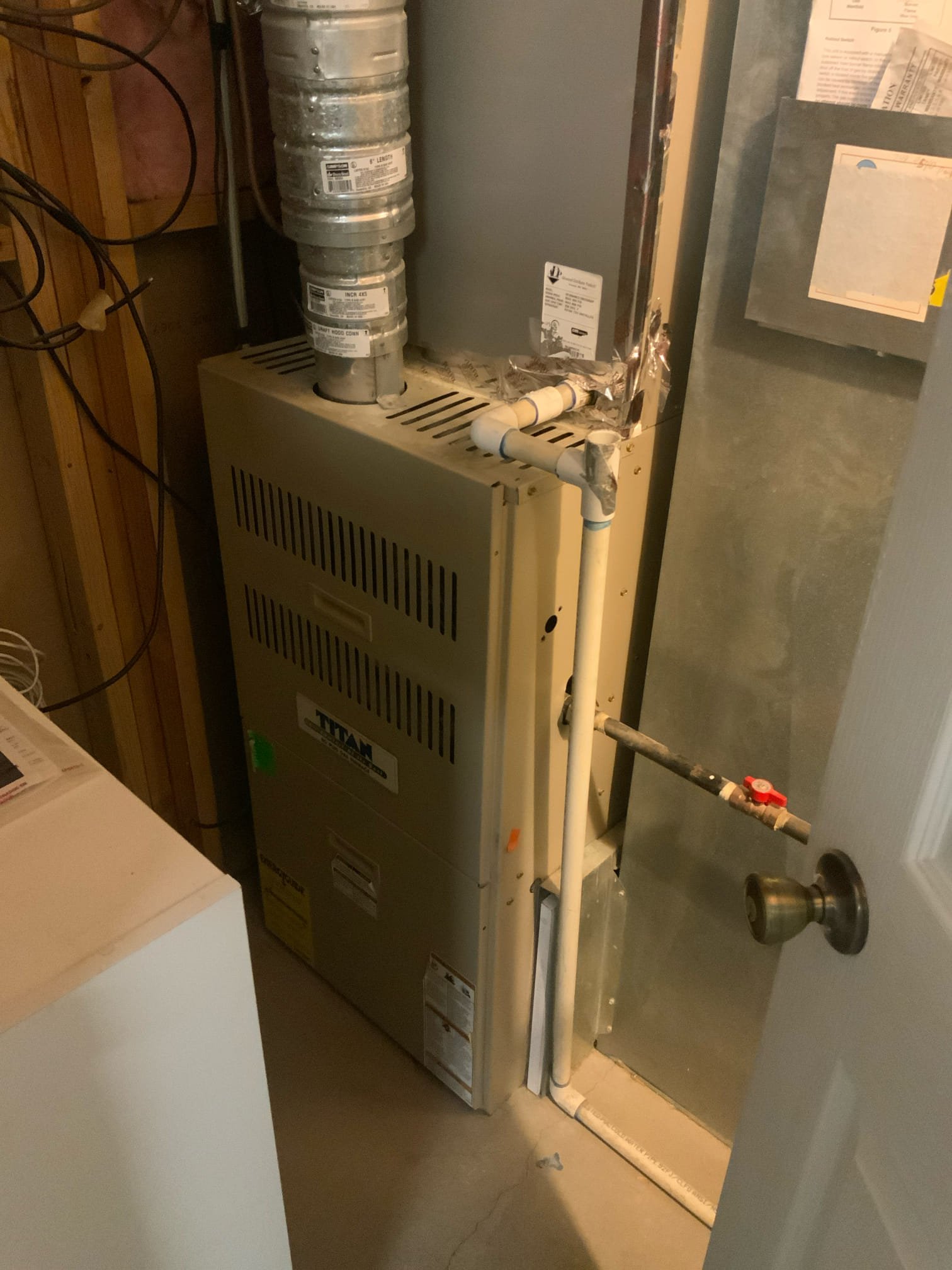 Image of a modern, energy-efficient 3-ton commercial condenser unit, highlighting its compact design and durable construction, installed on a commercial building rooftop. The image emphasizes the unit's accessibility for maintenance, suggesting ease of service by commercial air conditioning contractors. The background shows a well-maintained commercial HVAC system, conveying reliability and cost-effectiveness.