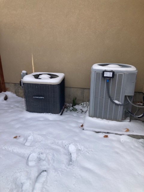 Image showcasing a pristine, modern HVAC unit with a prominent '95% Efficient' label. A homeowner smiles in the foreground, holding a tablet displaying a low 'HVAC Maintenance Cost Near Me' quote. The background subtly features a home warranty logo, suggesting peace of mind and cost savings.