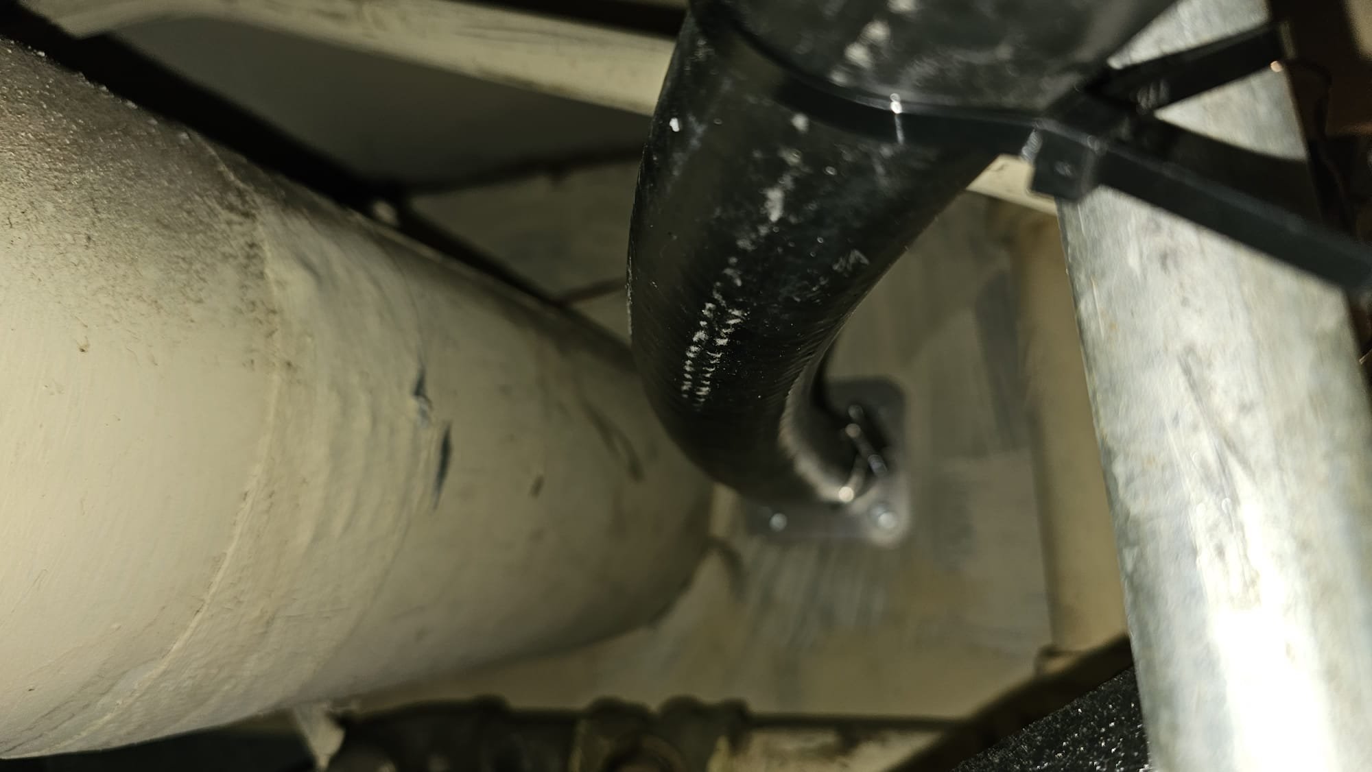 Urgently needed flood recovery services at a home. Shows fast response with a licensed technician assisting homeowners, emphasizing 24/7 availability and immediate relief from water damage.