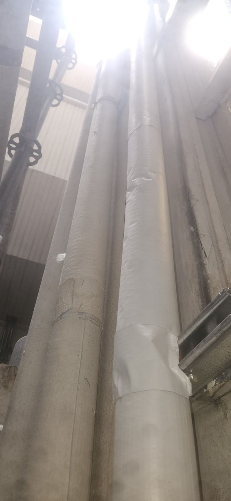 A clean, stainless steel commercial kitchen floor sink efficiently drains water, preventing pooling. This highlights a well-maintained property, reducing flood risk and potentially lowering commercial flood insurance premiums.