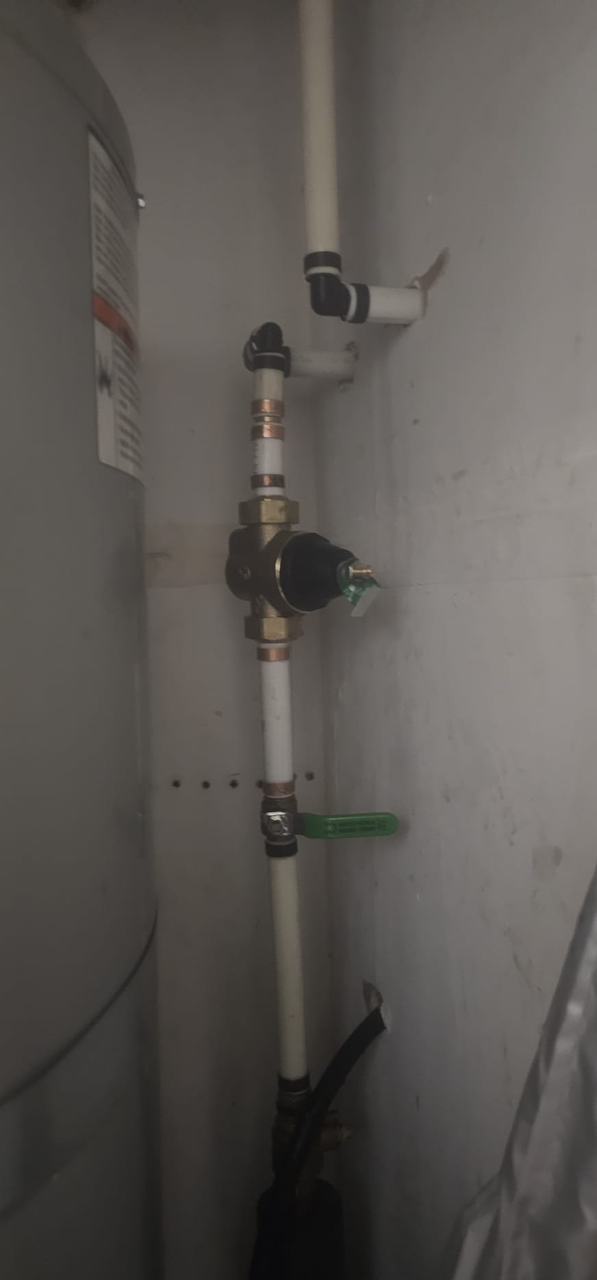 Clean, bright room showcasing a newly repaired ceiling, free from water stains, indicating effective residential water damage remediation. The pristine finish highlights the value and quality of professional installation, suggesting worthwhile pricing.