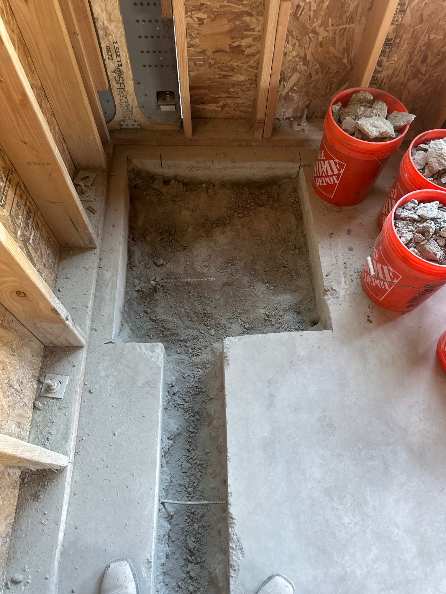 Image depicts a pristine, newly repaired sewer line section, showcasing its smooth interior and robust construction. The surrounding excavated area is clean and well-organized, implying minimal disruption and efficient repair. The visual emphasis is on the restored functionality and longevity of the sewer system, suggesting a worthwhile investment in clog prevention and future cost savings. A nearby inspection camera highlights the thoroughness of the repair process.