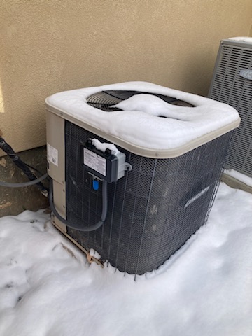 Image of a modern, energy-efficient furnace with a family smiling comfortably in the background. Clean air visibly swirling, suggesting improved air quality and lower energy bills. Text overlay highlights 'New Furnace Prices' and 'Savings on HVAC Replacement'.