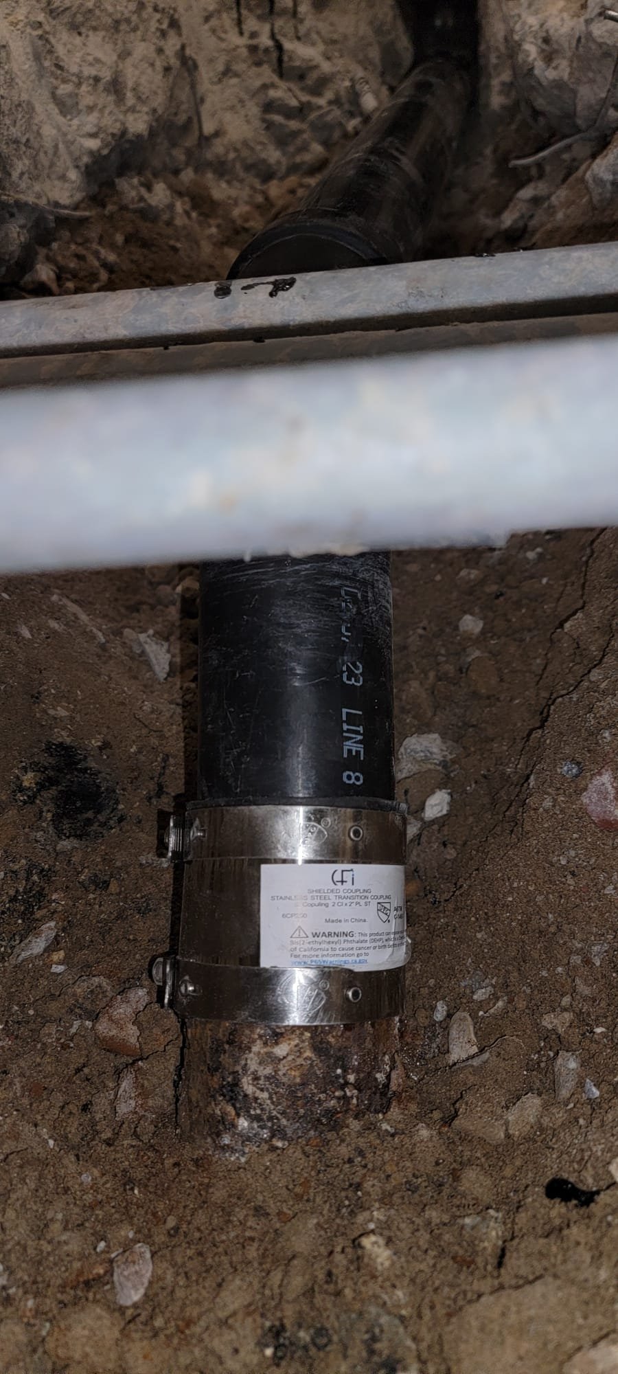 A dry, clean basement after local basement waterproofing with a visible waterproofing channel, showcasing the benefits of dewatering and a moisture-free space.